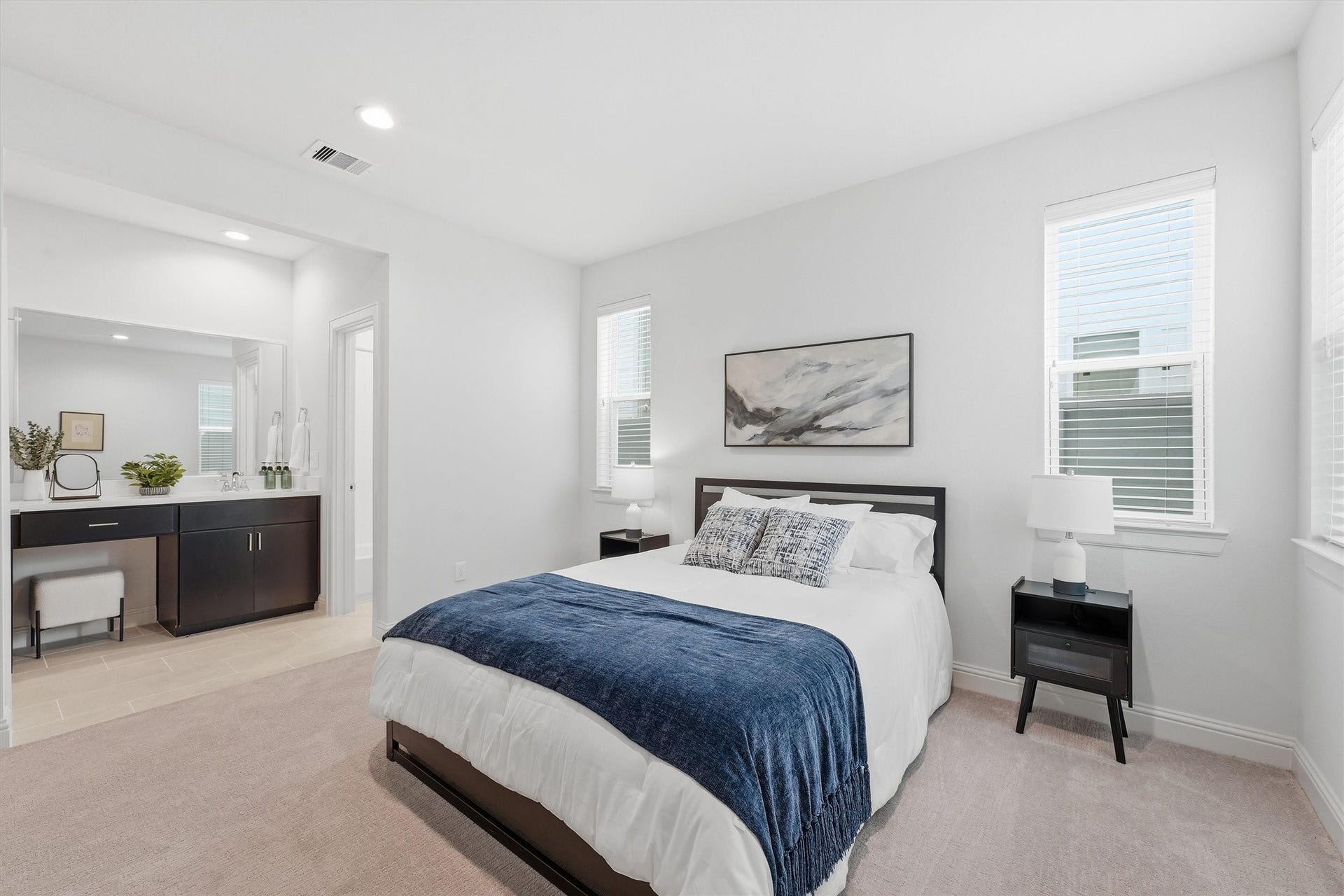 1804 Elysian Street, Houston, TX 77026 Indulge in ultimate comfort with this elegant guest suite, featuring a cozy bedroom and private en-suite bathroom for a perfect relaxing retreat.