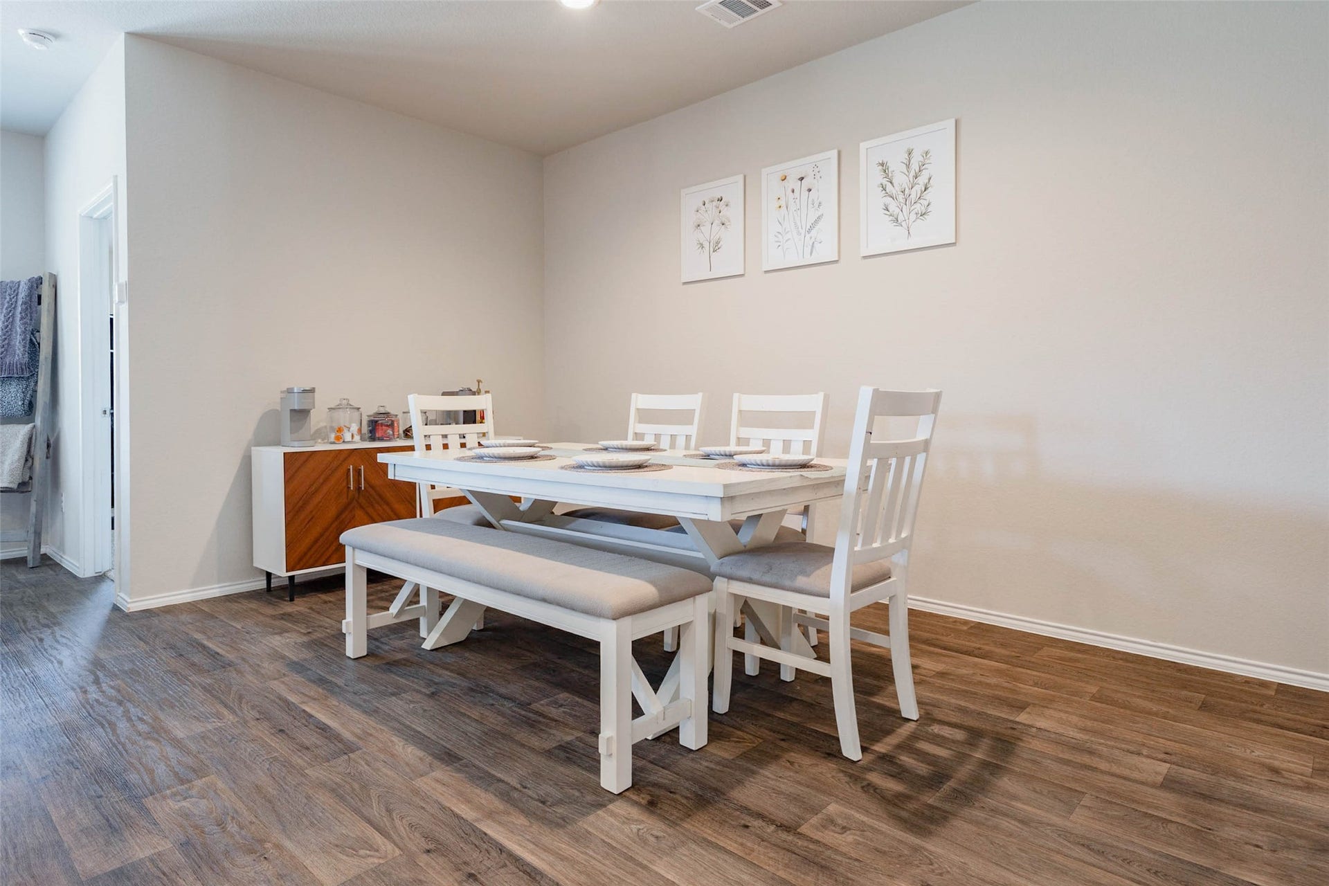 15303 Dinnet Berm Drive, Humble, TX 77346 This second look at the dining room shows how much space there is to work with. A buffet or china cabinet would fit comfortably along one wall, while the generous wall opposite offers an ideal backdrop for your favorite artwork or decor.