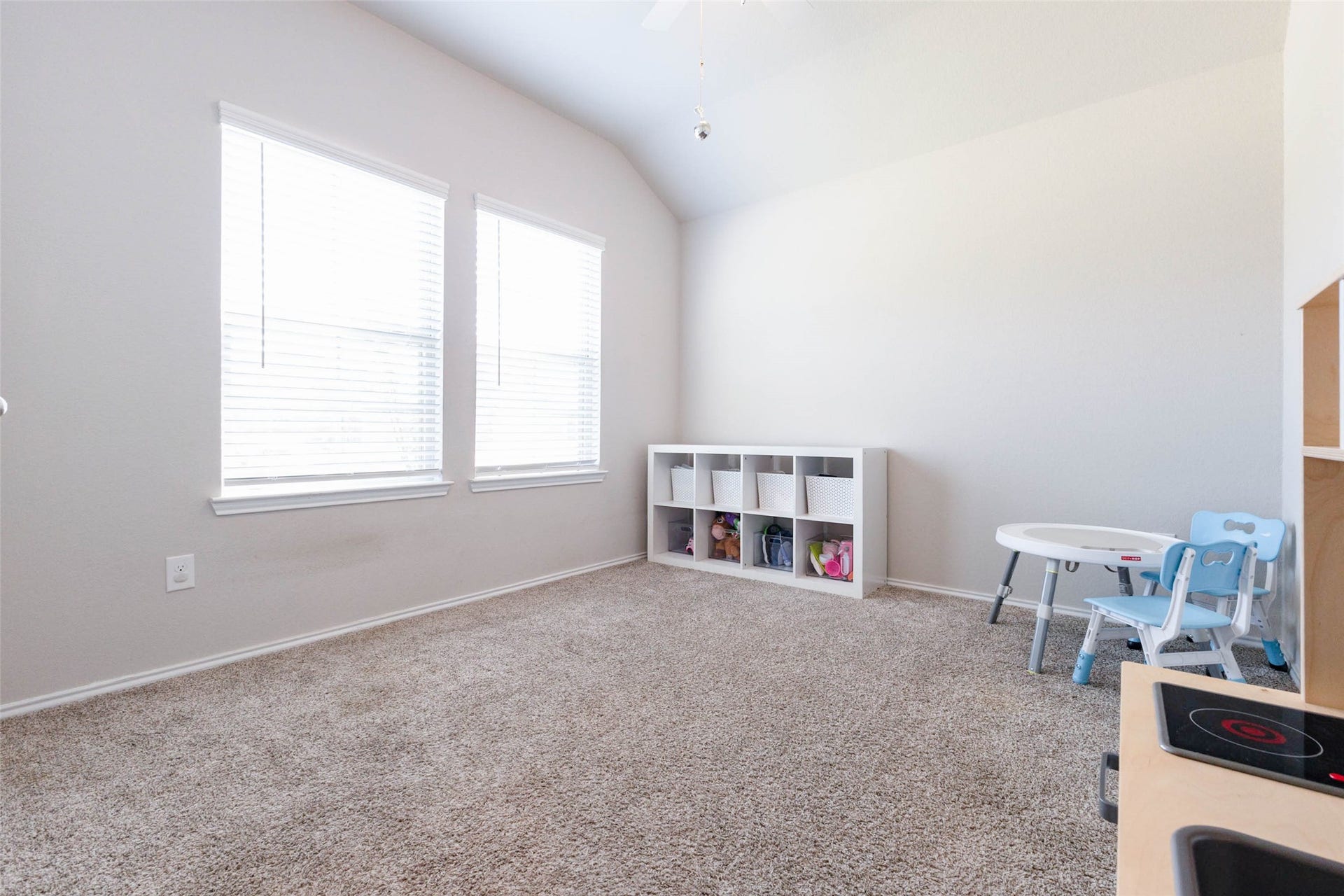 15303 Dinnet Berm Drive, Humble, TX 77346 This beautiful home offers three secondary bedrooms, and this one is a standout. Soft carpet, fresh paint, and a ceiling fan make it comfortable year round, while two large windows keep the room bright.