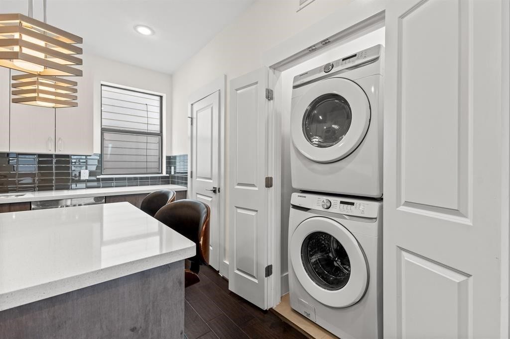 2401 Crawford Street, #A-213, Houston, TX 77004 Laundry area and door to half bath