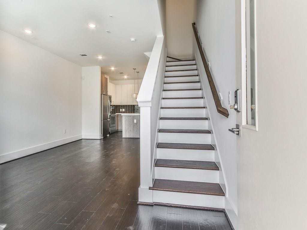 2401 Crawford Street, #A-213, Houston, TX 77004 Door opens to an open concept living area and stairs leading to bedrooms