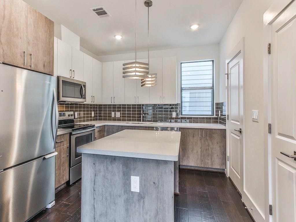 2401 Crawford Street, #A-213, Houston, TX 77004 Beautifully designed kitchen area with island