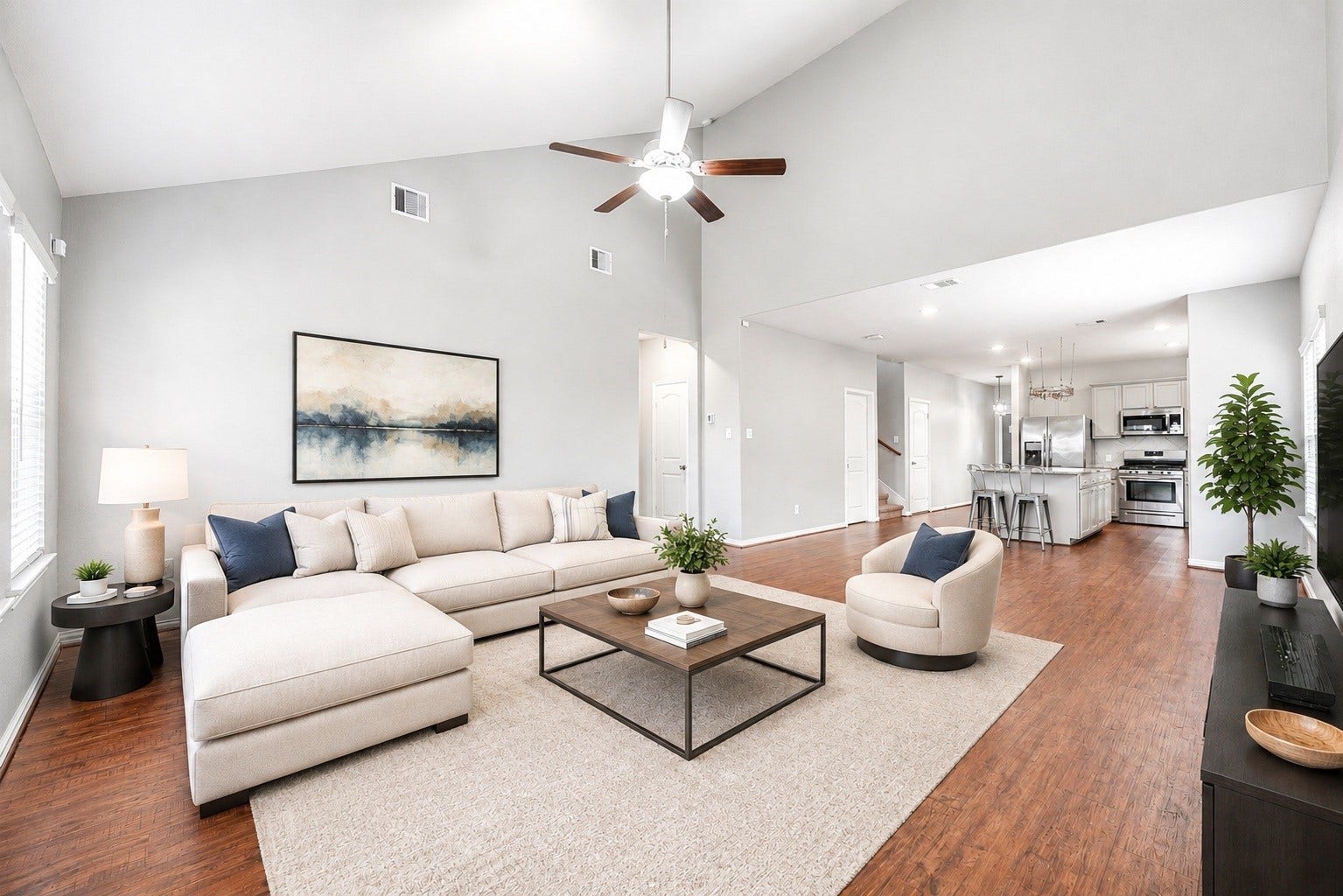 6418 Shadowbrook Hollow Trail, Katy, TX 77493 Looking back across the sweeping family room emphasizes the grand scale of the main living area, perfectly tailored for hosting gatherings or enjoying quiet evenings in a highly usable, airy environment. Virtually staged.