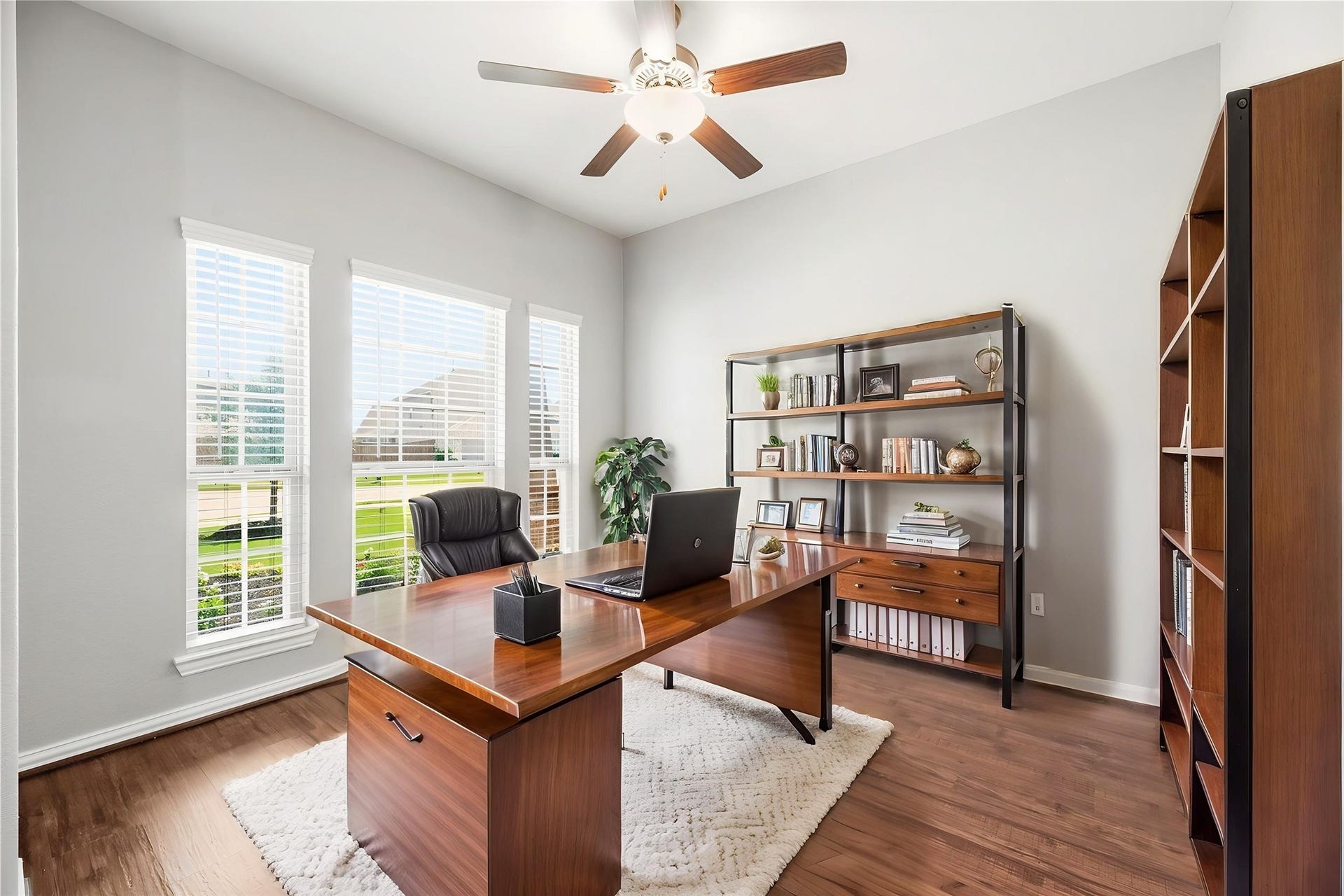 6418 Shadowbrook Hollow Trail, Katy, TX 77493 Positioned at the front of the home, this versatile area features an independent ceiling fan that overlooks the cul-de-sac, making it an ideal formal dining area or a sunlit home office/study. Virtually staged.