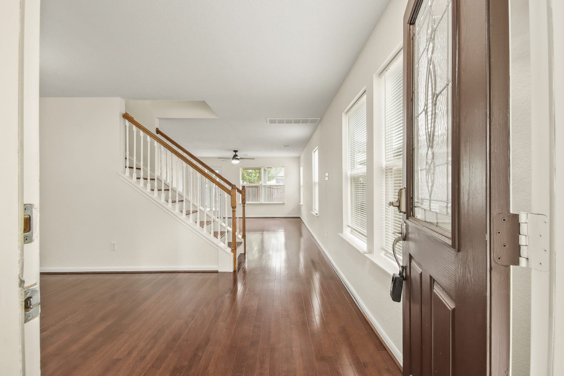 255 Silky Leaf Drive, Houston, TX 77073 You'll be instantly greeted by beautiful wood floors, and a view straight back into the main living areas.