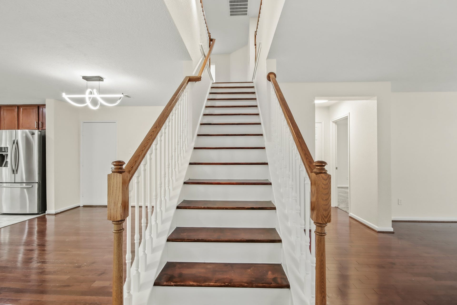 255 Silky Leaf Drive, Houston, TX 77073 A well positioned staircase serves as a central feature, providing convenient access to the second-floor areas.