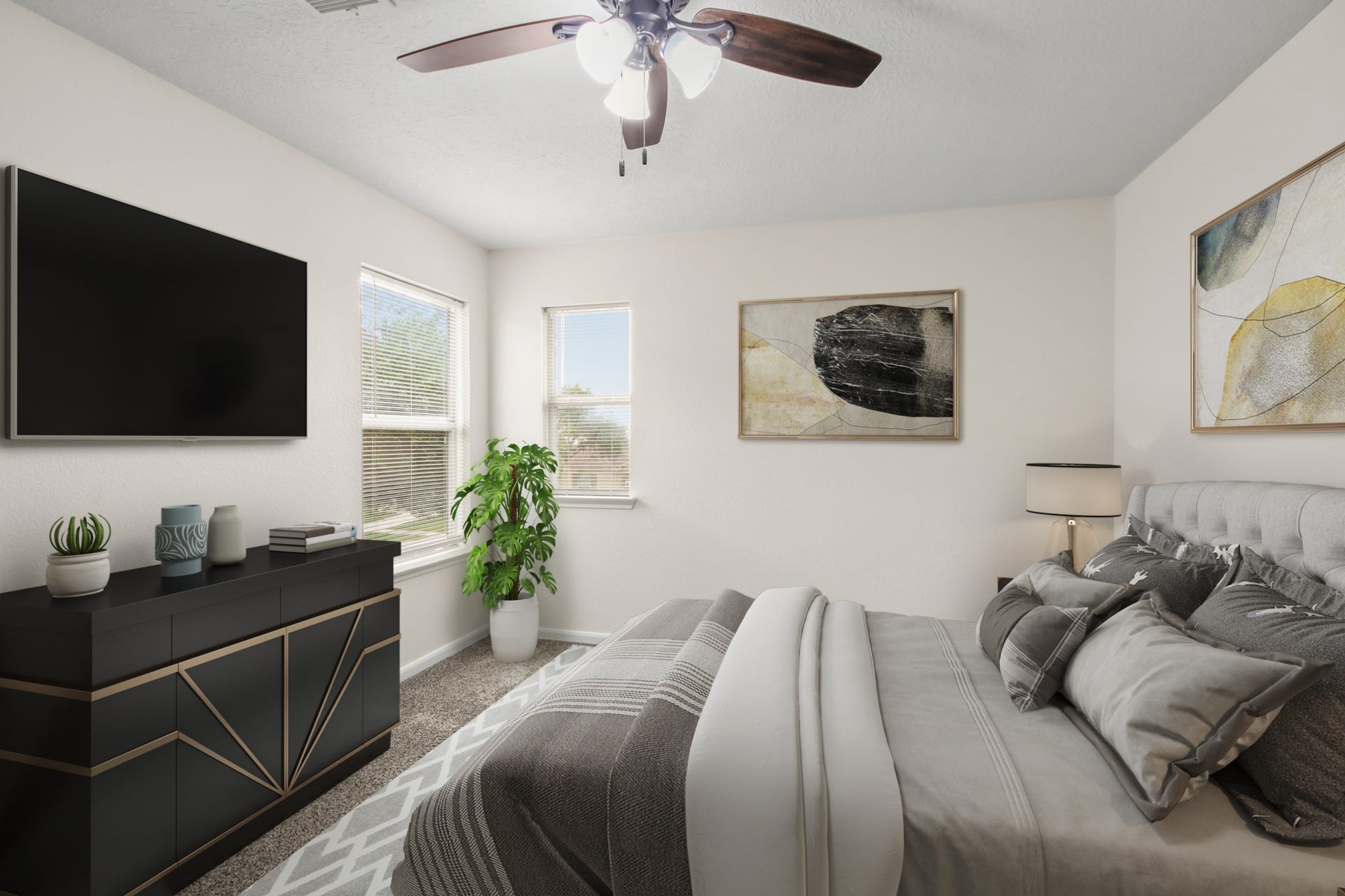 255 Silky Leaf Drive, Houston, TX 77073 Virtually Staged: Secondary bedroom with carpet floors, a ceiling fan, and abundant natural light pours through the windows, offering a pleasant view of the backyard.