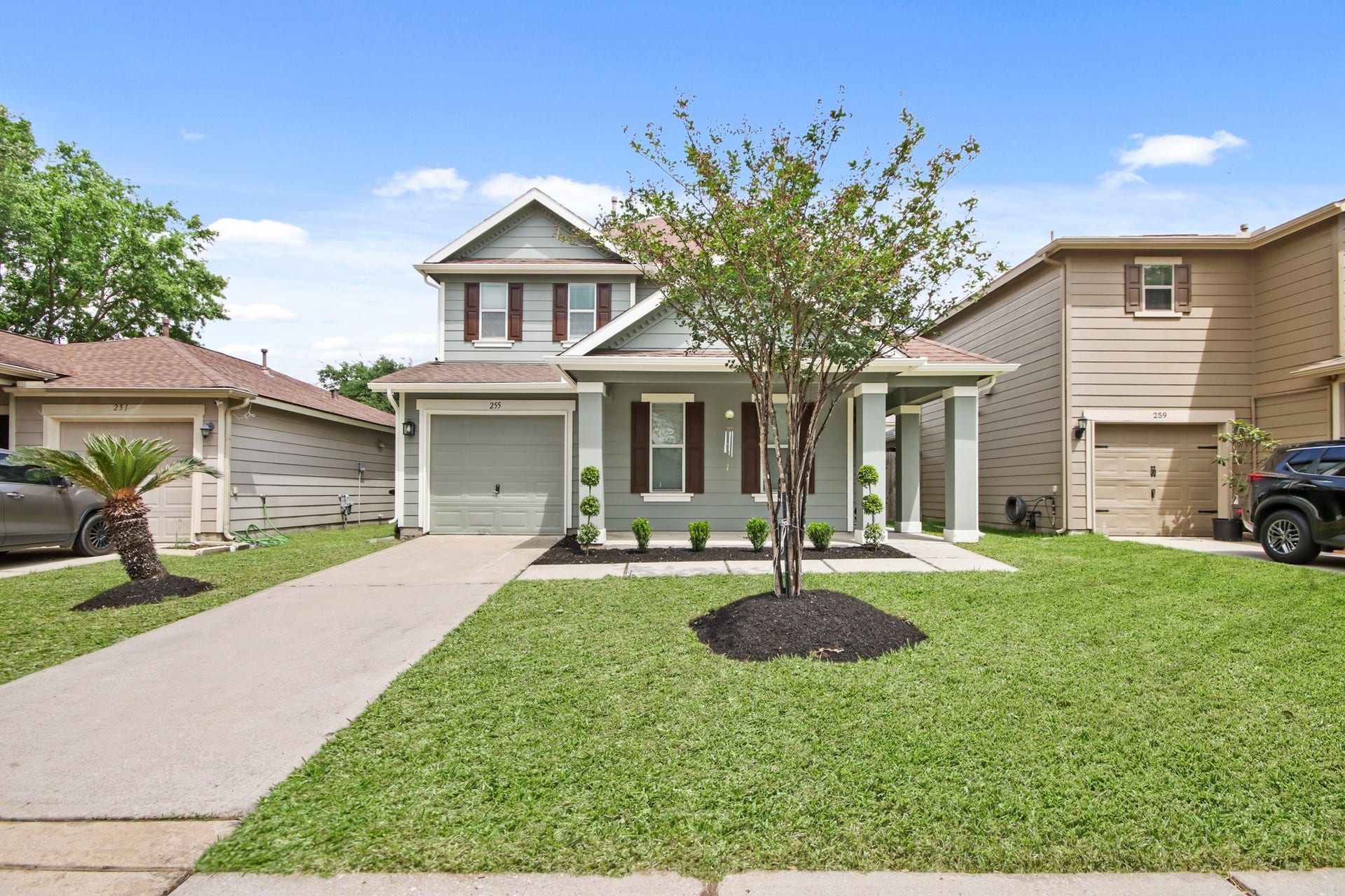 255 Silky Leaf Drive, Houston, TX 77073 The home features a single-car garage, with a long driveway.