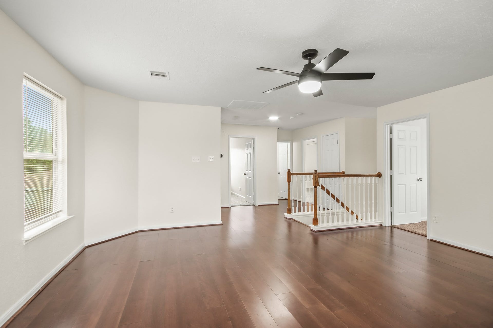255 Silky Leaf Drive, Houston, TX 77073 This spacious and versatile flex room has rich wood flooring, neutral walls, and abundant natural light. It is perfect for a kids playroom or unique adult hangout, the options are endless!