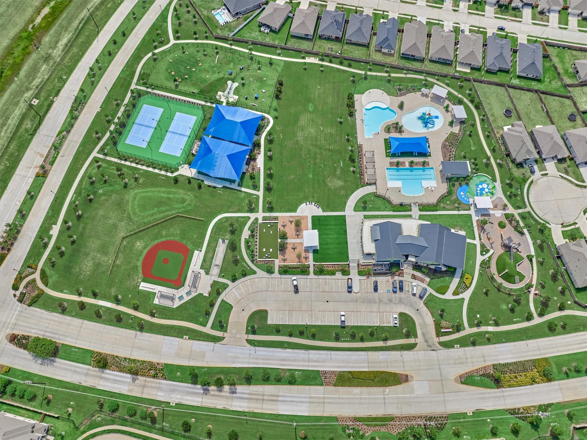 20010 Sienna Green Drive, Hockley, TX 77447 Cypress Green Amenity Center includes Fitness Center, Resort-Syle Pool with Aqua Zip, Water Feature, Lap Pool, Bark Park, Batting Cage, Clubhouse, Nature-Inspired Playground, Pickleball Courts, Splash Pad, Tennis Court and Wiffle Ball Field.