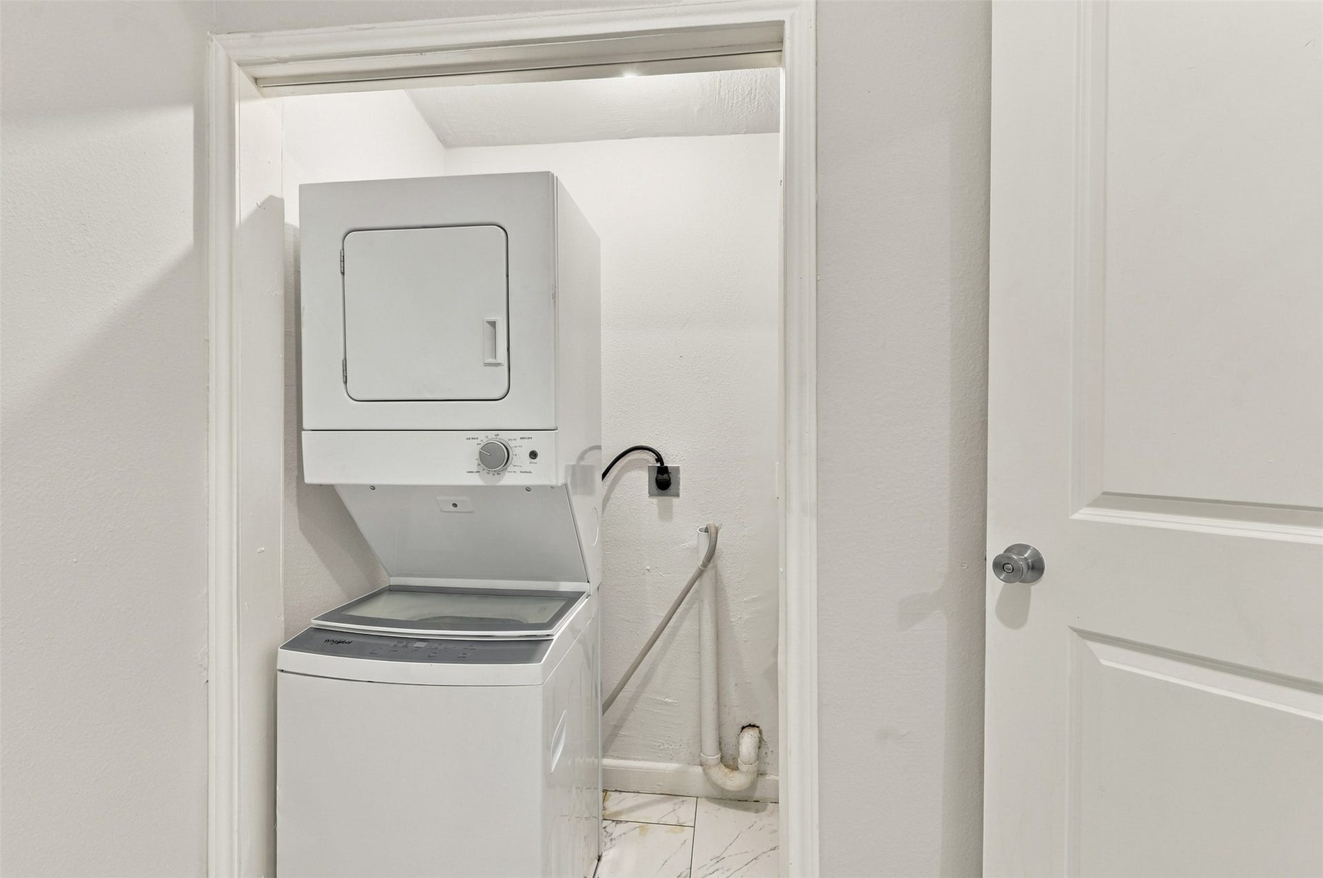 What a convenient feature to have right at home! The dedicated utility area includes washer and dryer connections, providing a practical spot for laundry and helping make everyday household chores a little easier.