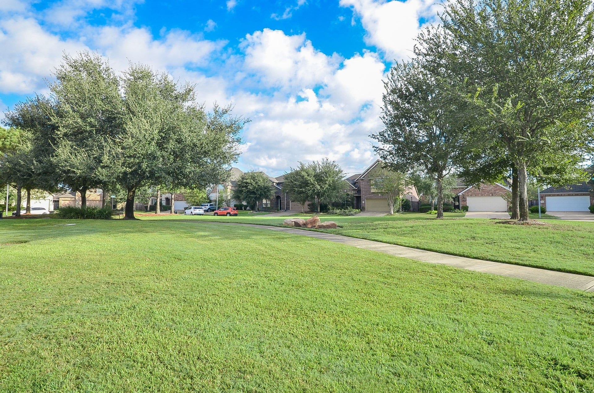 28503 Pleasant Forest Drive, Katy, TX 77494 Enjoy the beautiful open green space directly across the street from your new home!