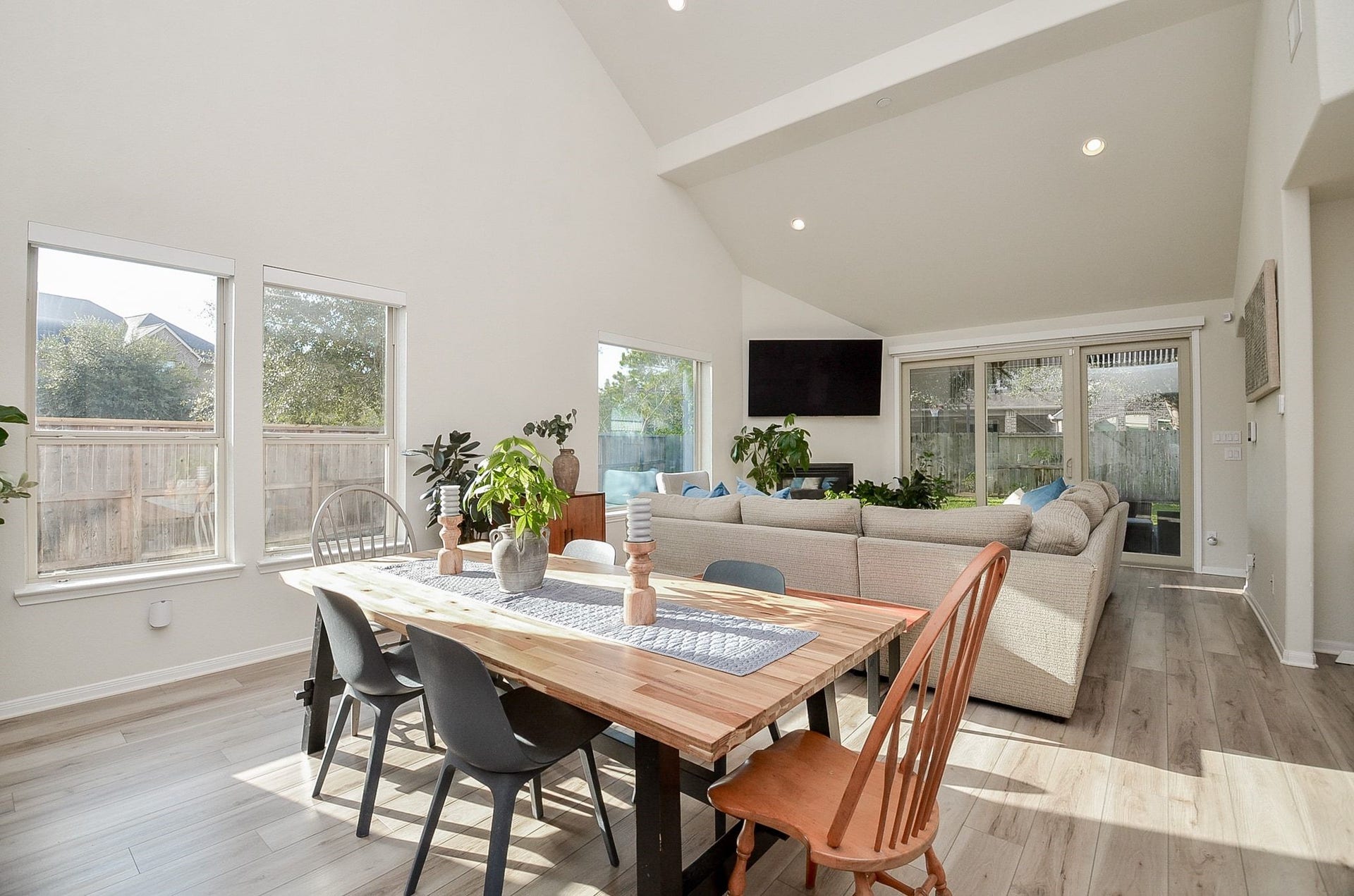 28503 Pleasant Forest Drive, Katy, TX 77494 Sun-filled dining and living spaces with high ceilings and updated flooring.
