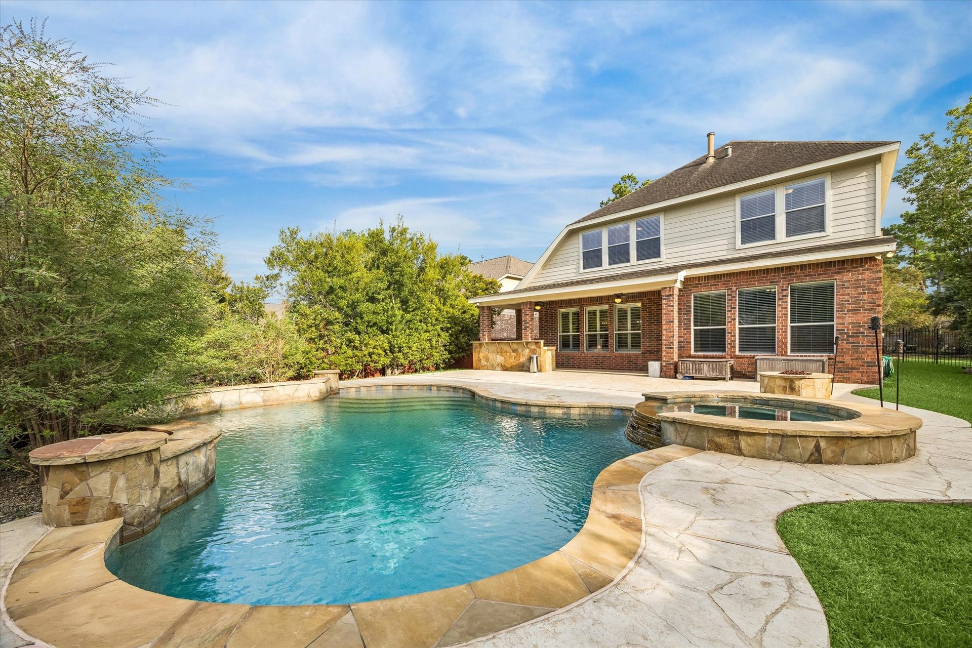 106 W Arbor Camp Circle, Spring, TX 77389 Yard and pool service covered by landlord. Full outdoor kitchen includes grill and mini fridge.