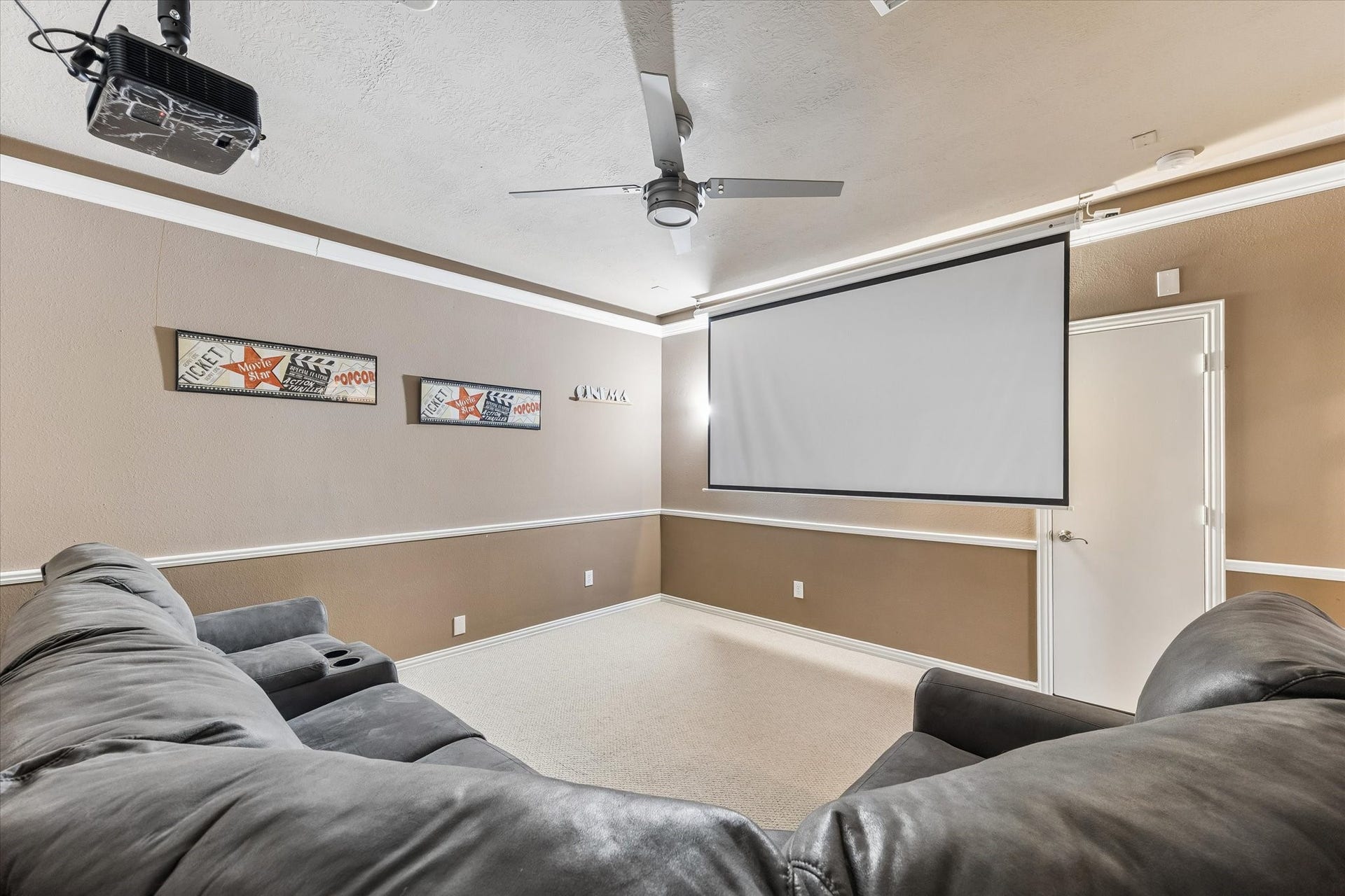 106 W Arbor Camp Circle, Spring, TX 77389 Media room seating and equipment is included. All you need to bring is the popcorn!