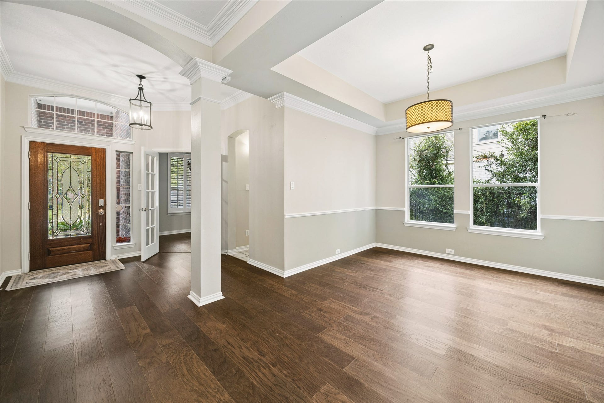 106 W Arbor Camp Circle, Spring, TX 77389 Lots of sunlight flooding the home entrance. French doors open up to the home office/study