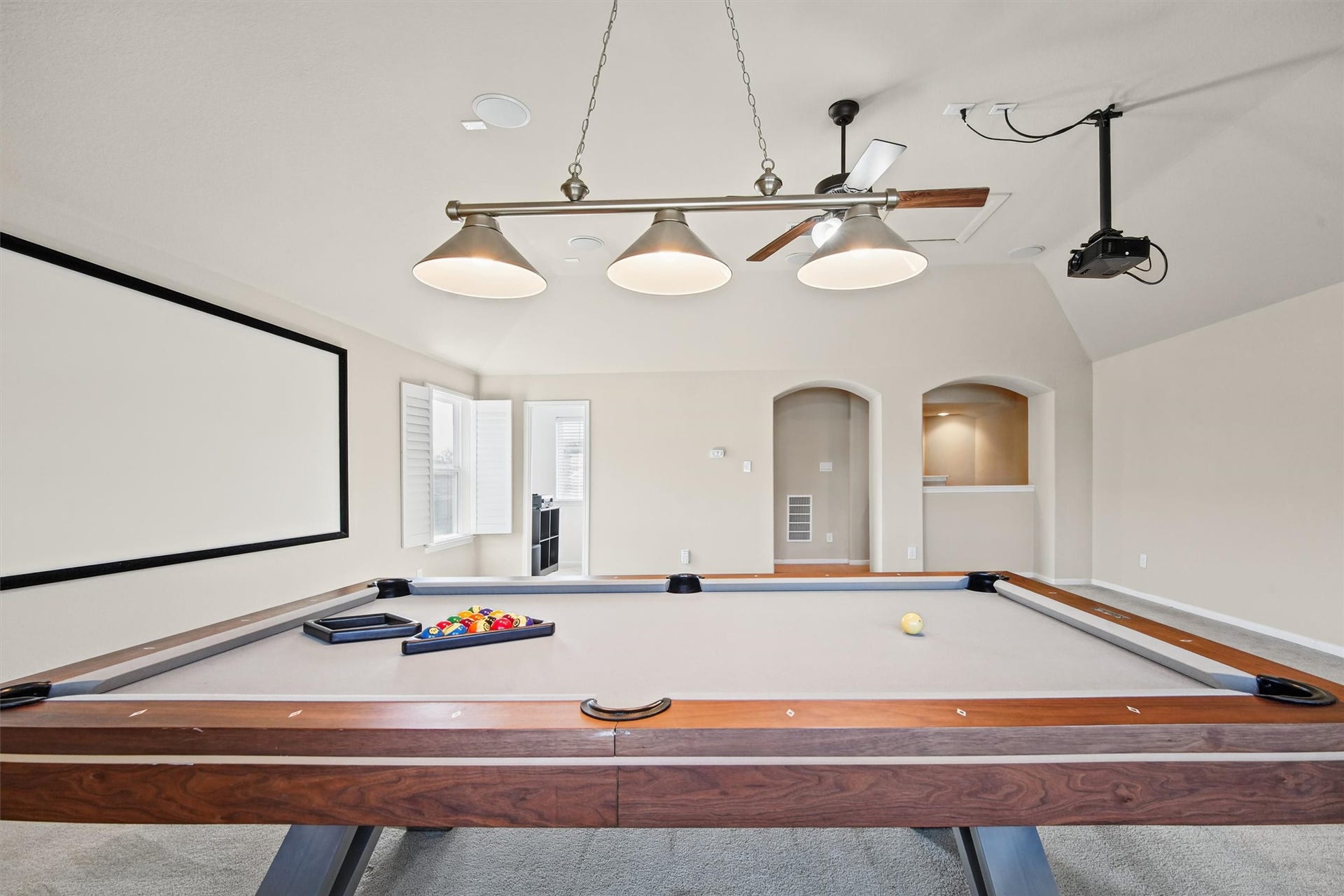 Pool table stays and is in pristine condition! Media equipment stays!
