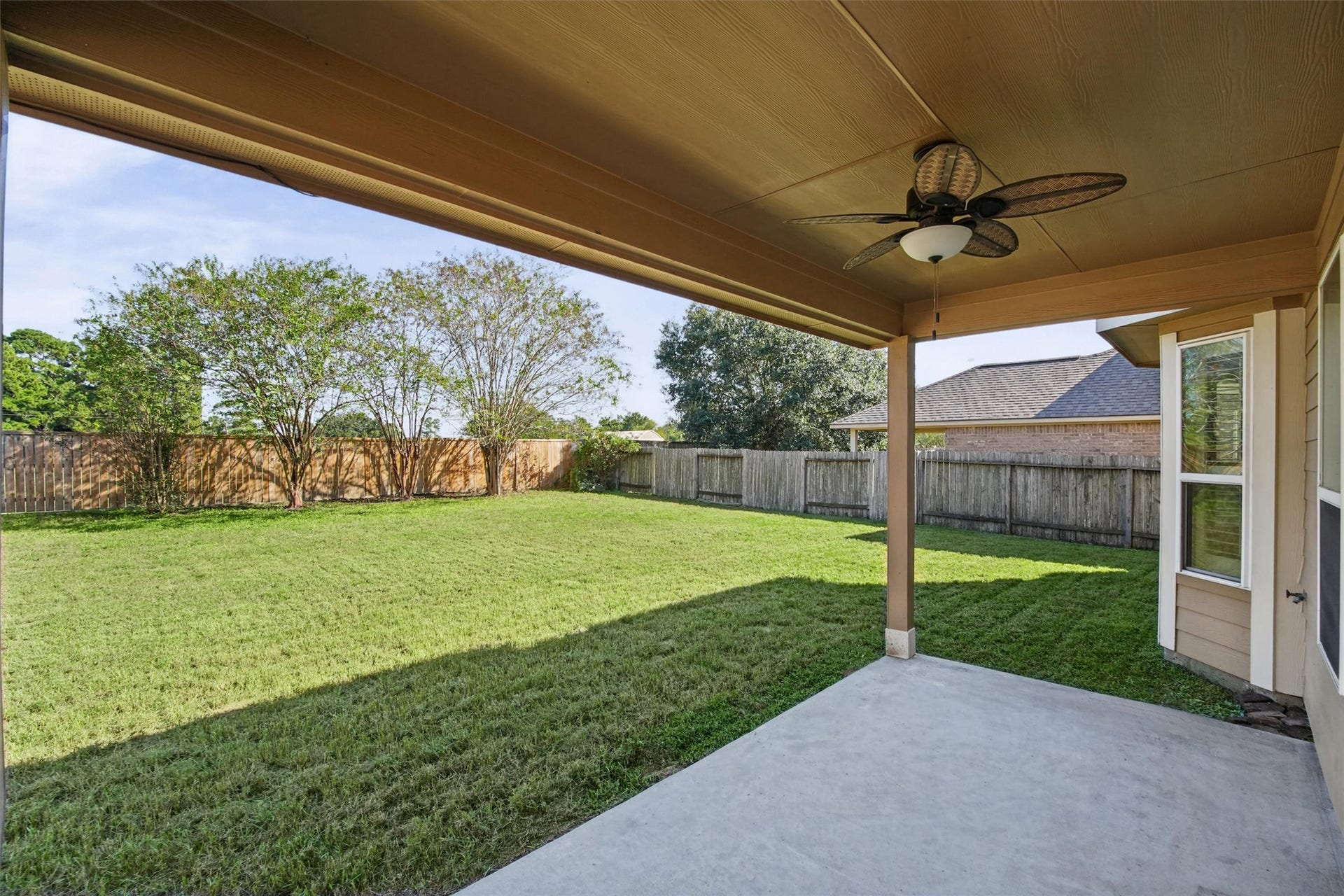 Large covered patio sets the stage for an amazing outdoor kitchen or outdoor living space!