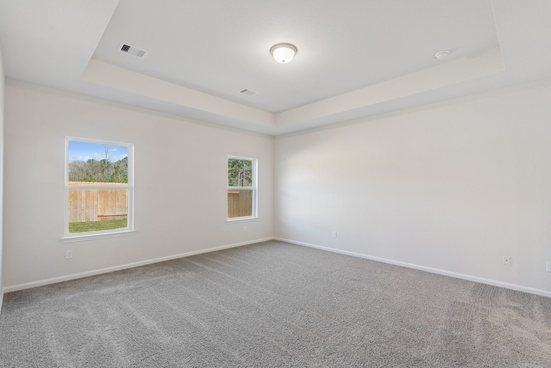 The Crawford- Primary Suite, Tray Ceiling not included. Home under construction, sample photo used for illustrative purposes only, colors and options will vary.