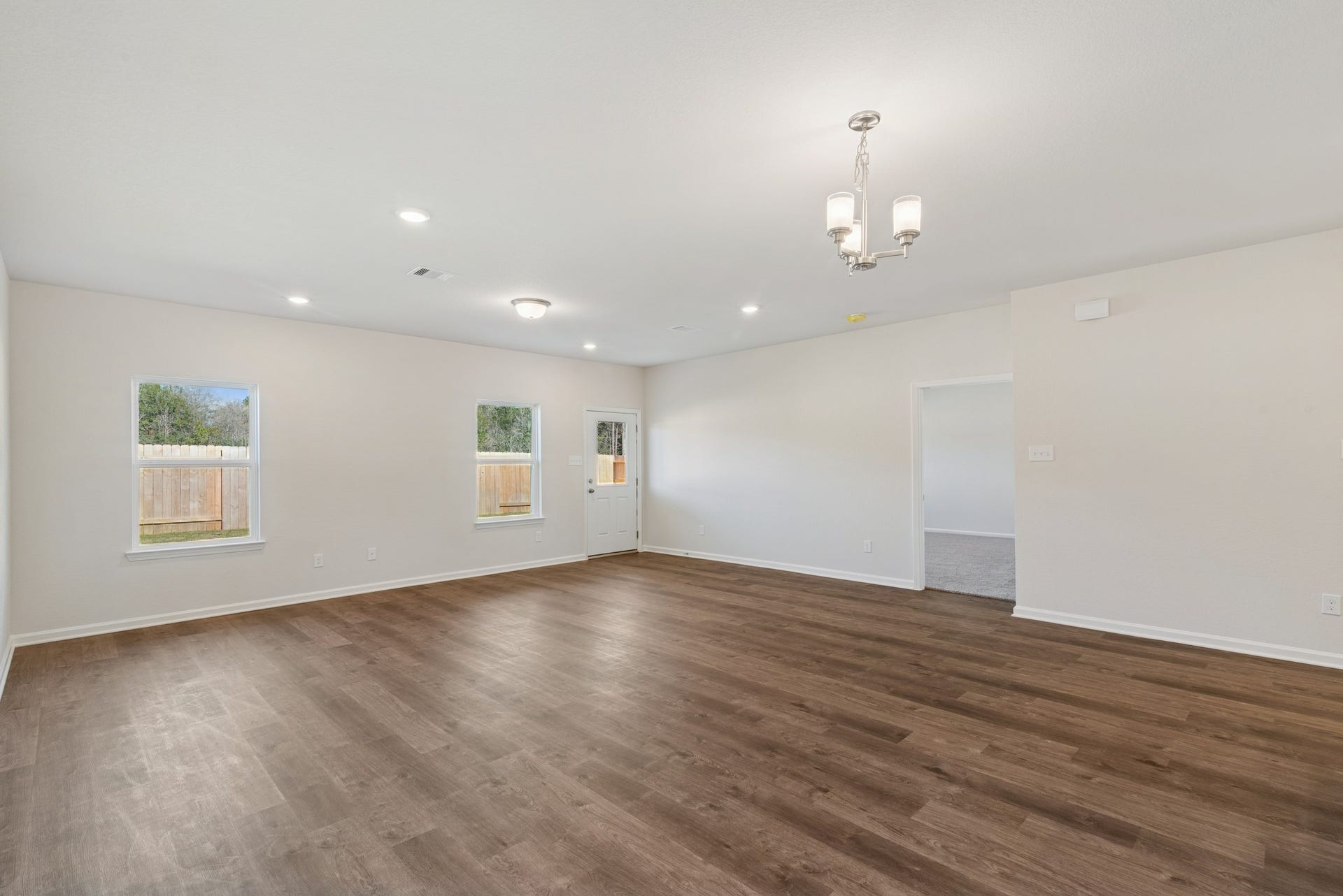 The Crawford- Family Room. Home under construction, sample photo used for illustrative purposes only, colors and options will vary.