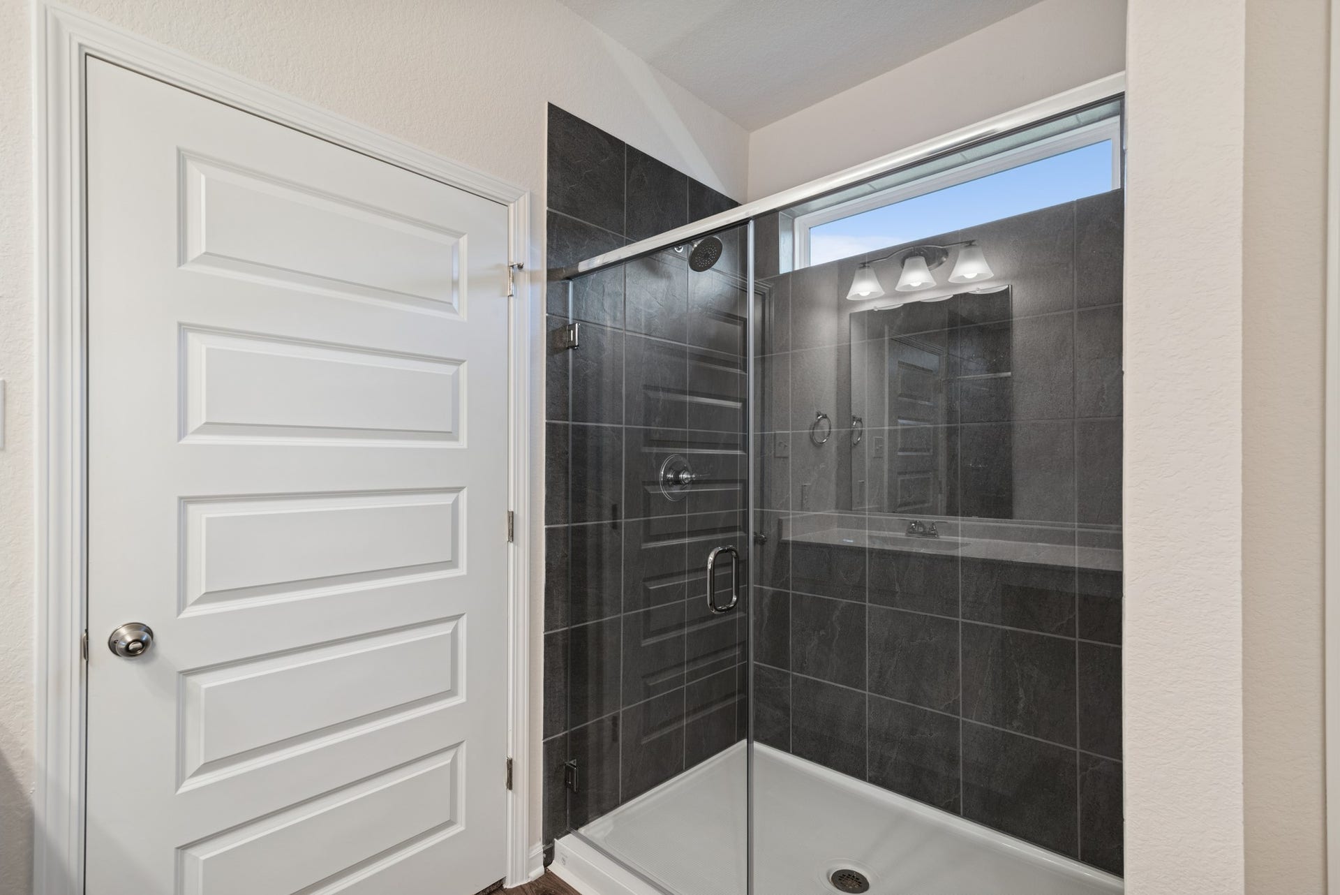 The Crawford- Primary Bath with Walk-In Shower. Home under construction, sample photo used for illustrative purposes only, colors and options will vary.