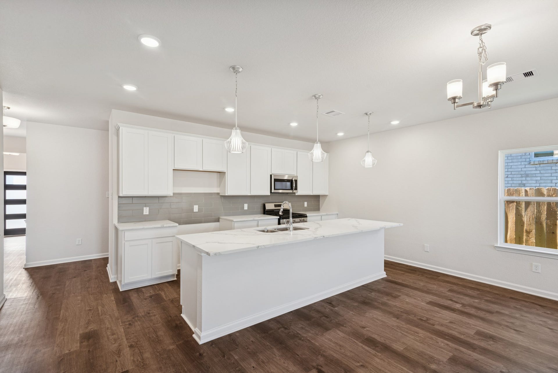 The Crawford- Kitchen. Home under construction, sample photo used for illustrative purposes only, colors and options will vary.