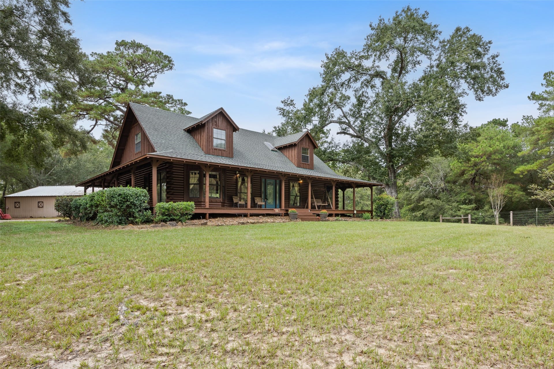 27874 Riley Road, Waller, TX 77484 Surrounded by 18+ acres, this beautiful log cabin offers room to roam, play and enjoy the outdoors. Inside, you'll find 2 bedrooms, 2.5 bathrooms and a versatile upstairs loft/game room with plenty of possibilities.