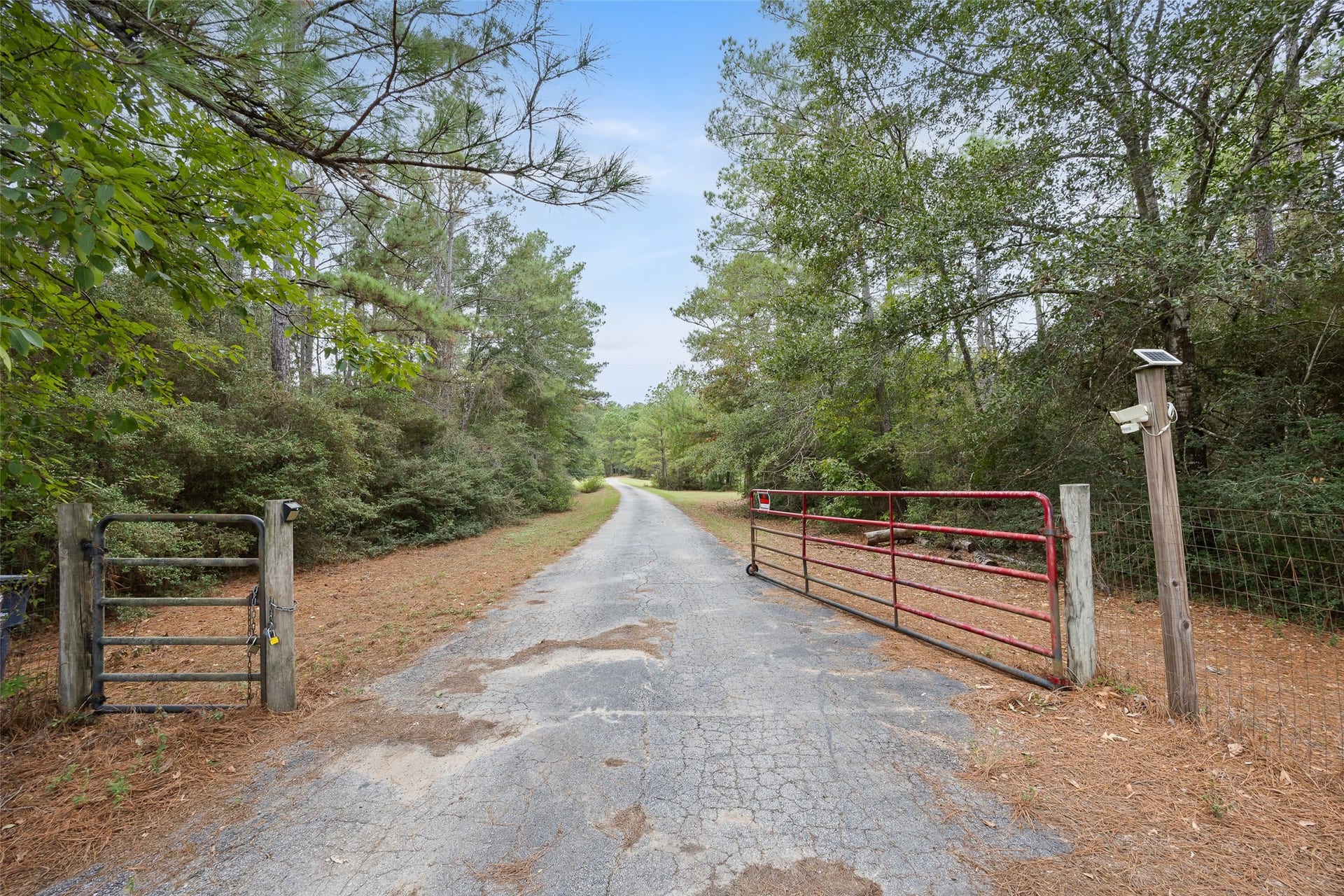 27874 Riley Road, Waller, TX 77484 You know the song Country roads, take me home... Well, this long, gated private driveway takes you through the trees and right to your own little piece of country paradise.