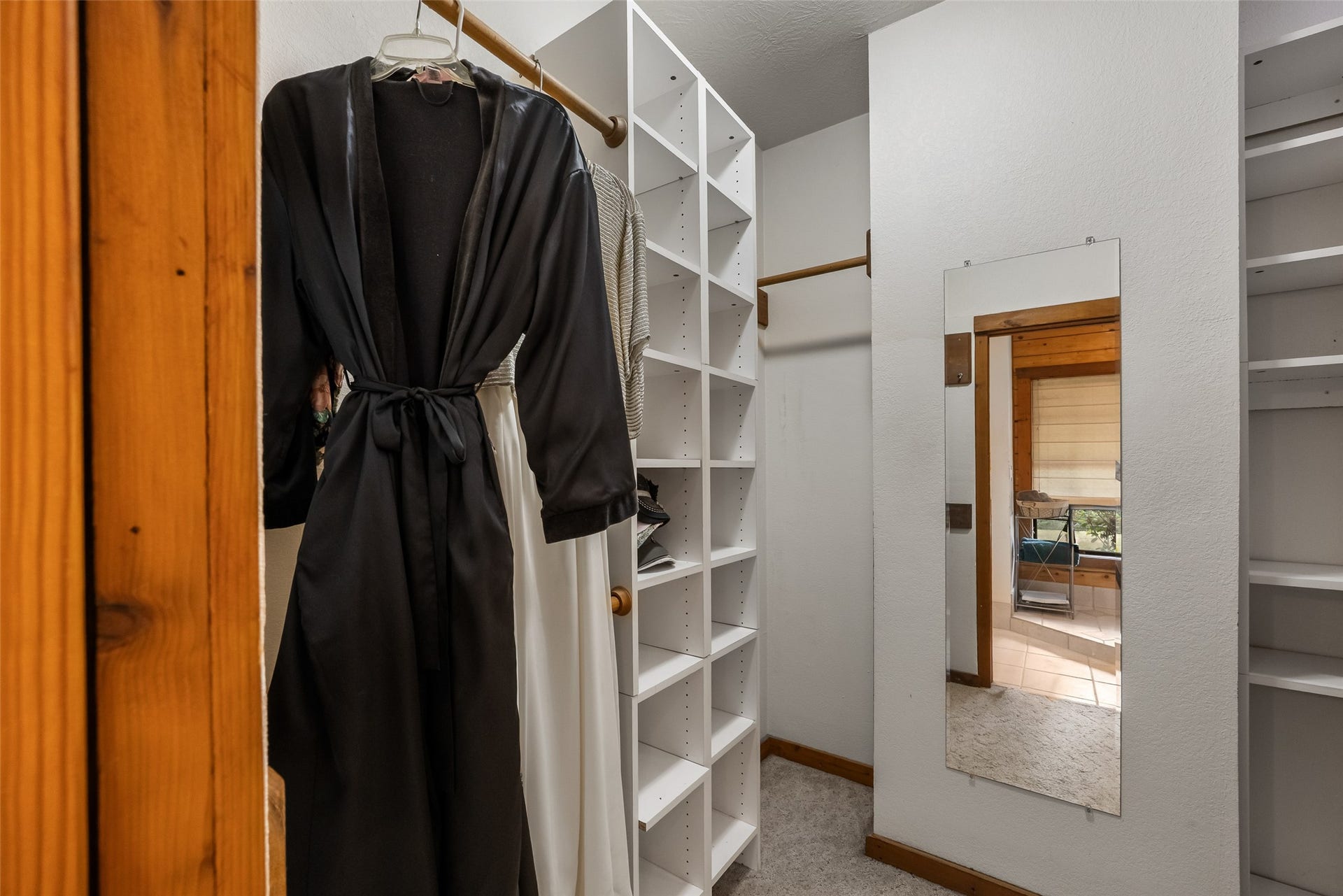 27874 Riley Road, Waller, TX 77484 You'll appreciate all the storage in this spacious walk-in closet, with multiple hanging rods, open shelving and a full-length mirror to make getting ready a little easier.