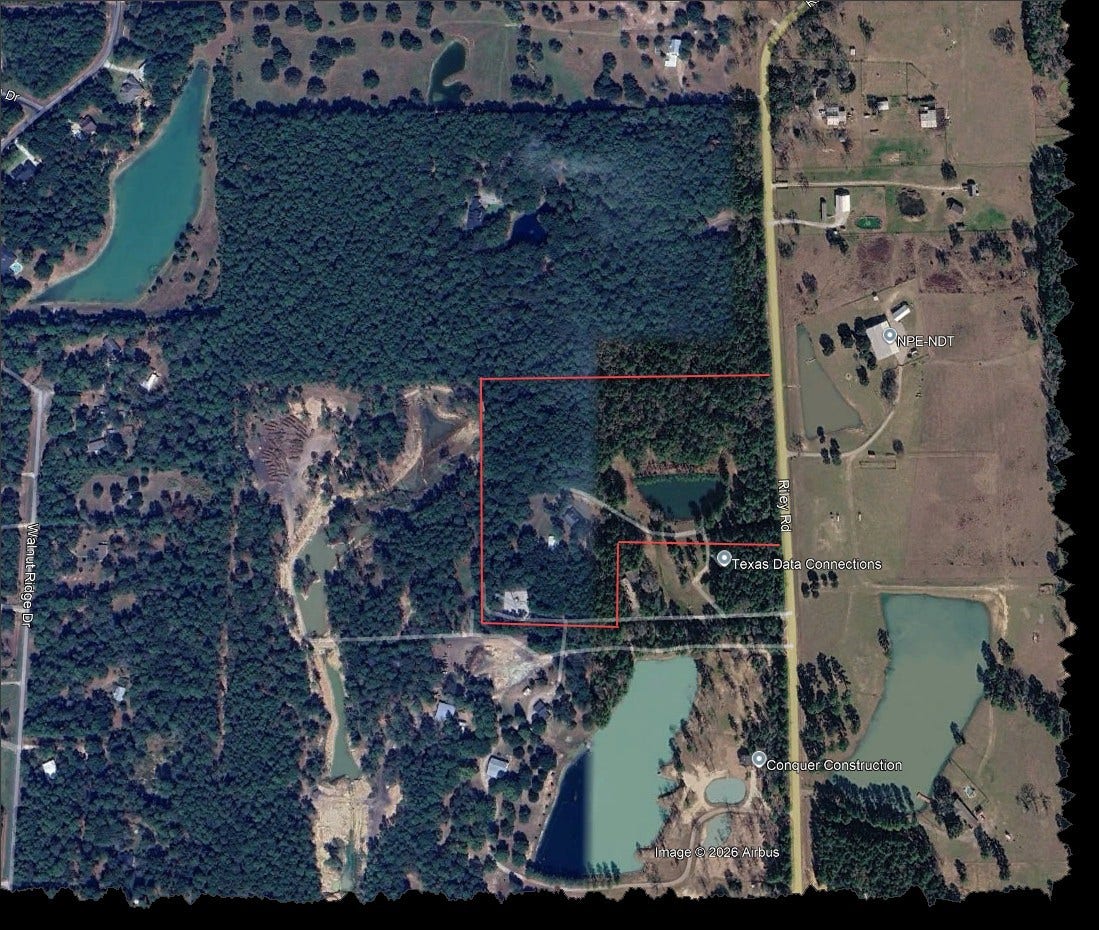 27874 Riley Road, Waller, TX 77484 Here's a bird's-eye view of your own little slice of country paradise! With 18+ acres of beautiful wooded land, a charming log cabin, a spacious barn and a private pond, there's plenty of room to roam, explore and enjoy the peaceful country lifestyle.