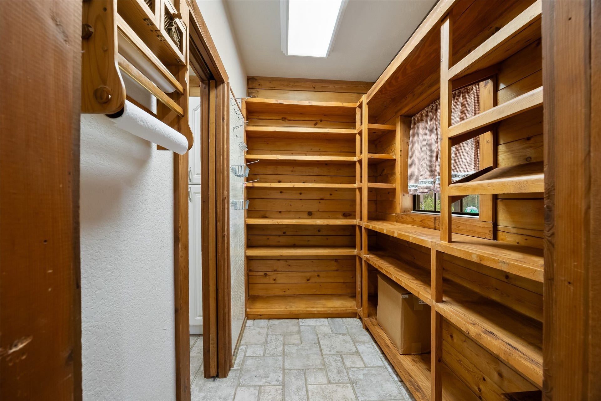 27874 Riley Road, Waller, TX 77484 Now this is a pantry! With walls of built-in wood shelving and plenty of room to organize groceries, kitchen essentials and those bulk purchases, keeping everything in its place is a breeze.