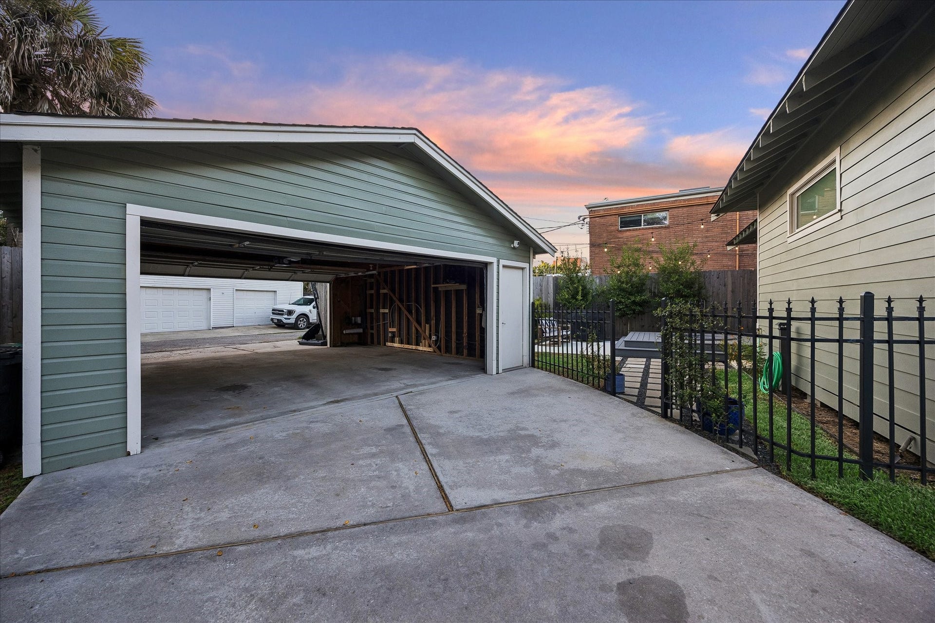 1635 Harvard Street, Houston, TX 77008 The two car garage can be accessed from both the driveway and the alley behind, making it incredibly easy to pull through and not have to shuffle cars!