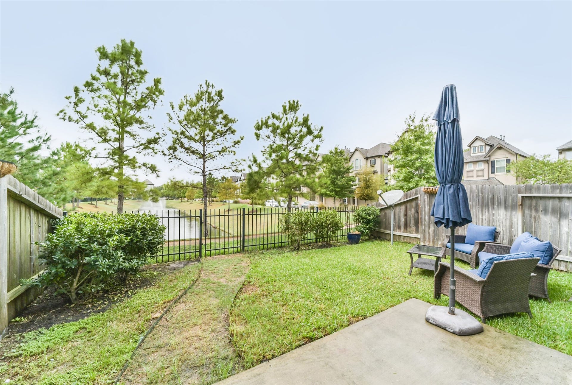1517 Miles Oaks Place, Houston, TX 77043 Backyard looking at water