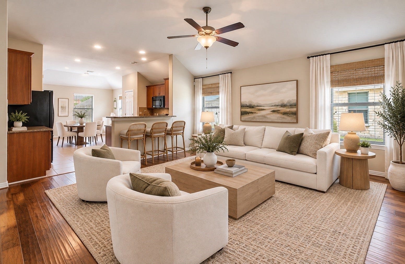 8746 Sunny Gallop Drive, Tomball, TX 77375 This family room space is open to the kitchen and features high ceilings, beautiful hardwoods, ceiling fan, lots of natural light and plenty of room for your furnishings. VIRTUALLY STAGED