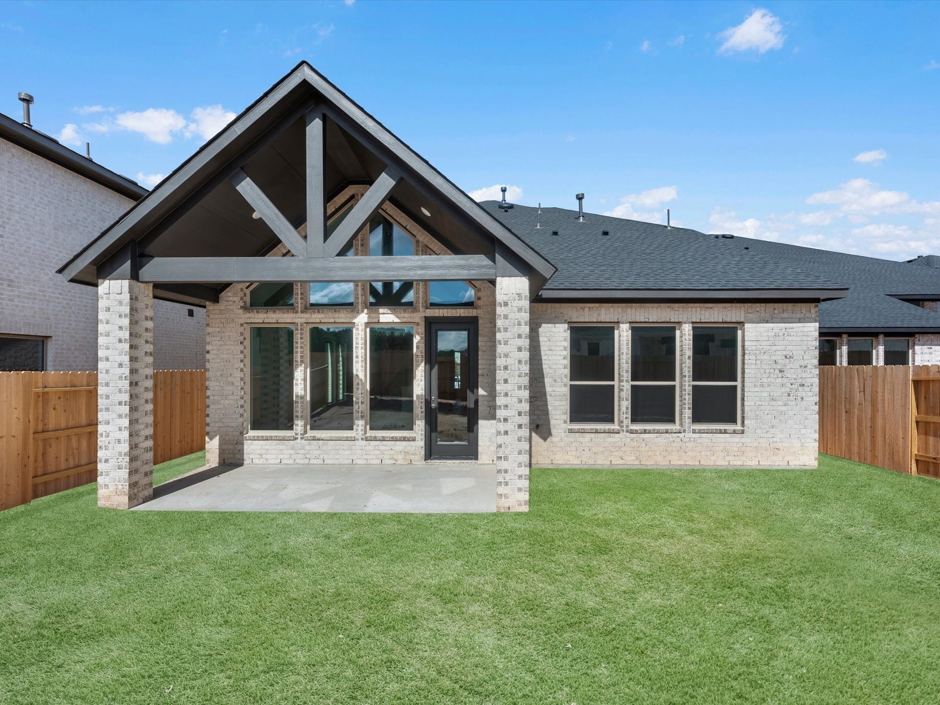 208 Yellow Rosewood Lane, New Caney, TX 77357 Grass is digitally enhanced.