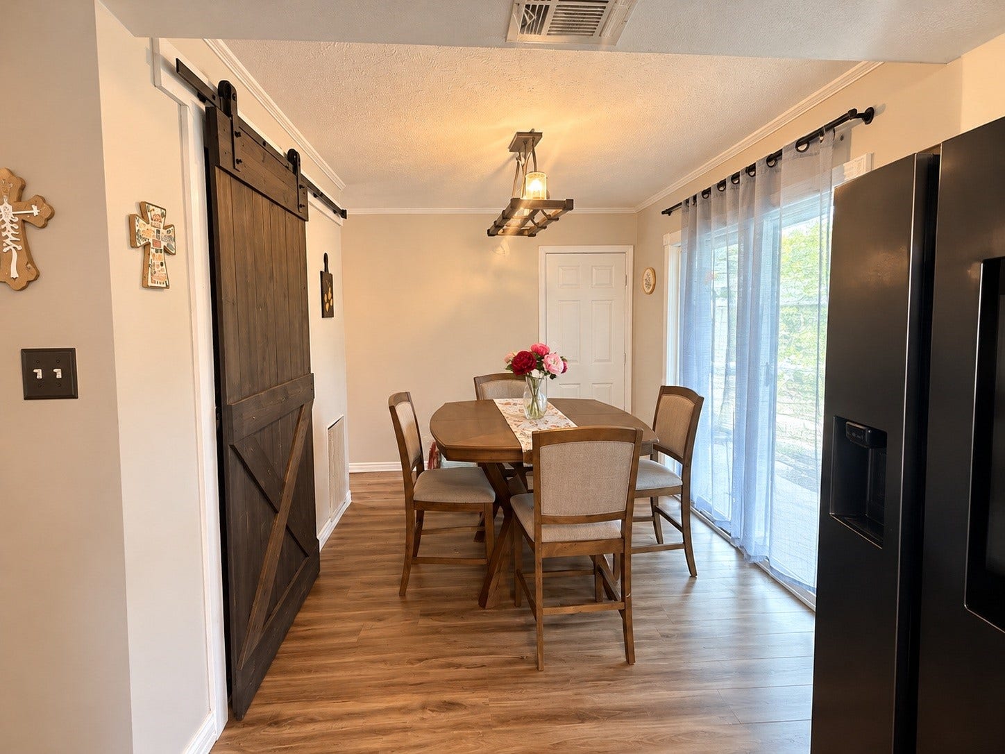 Dining area- Digitally enhanced to remove personal items and decor.