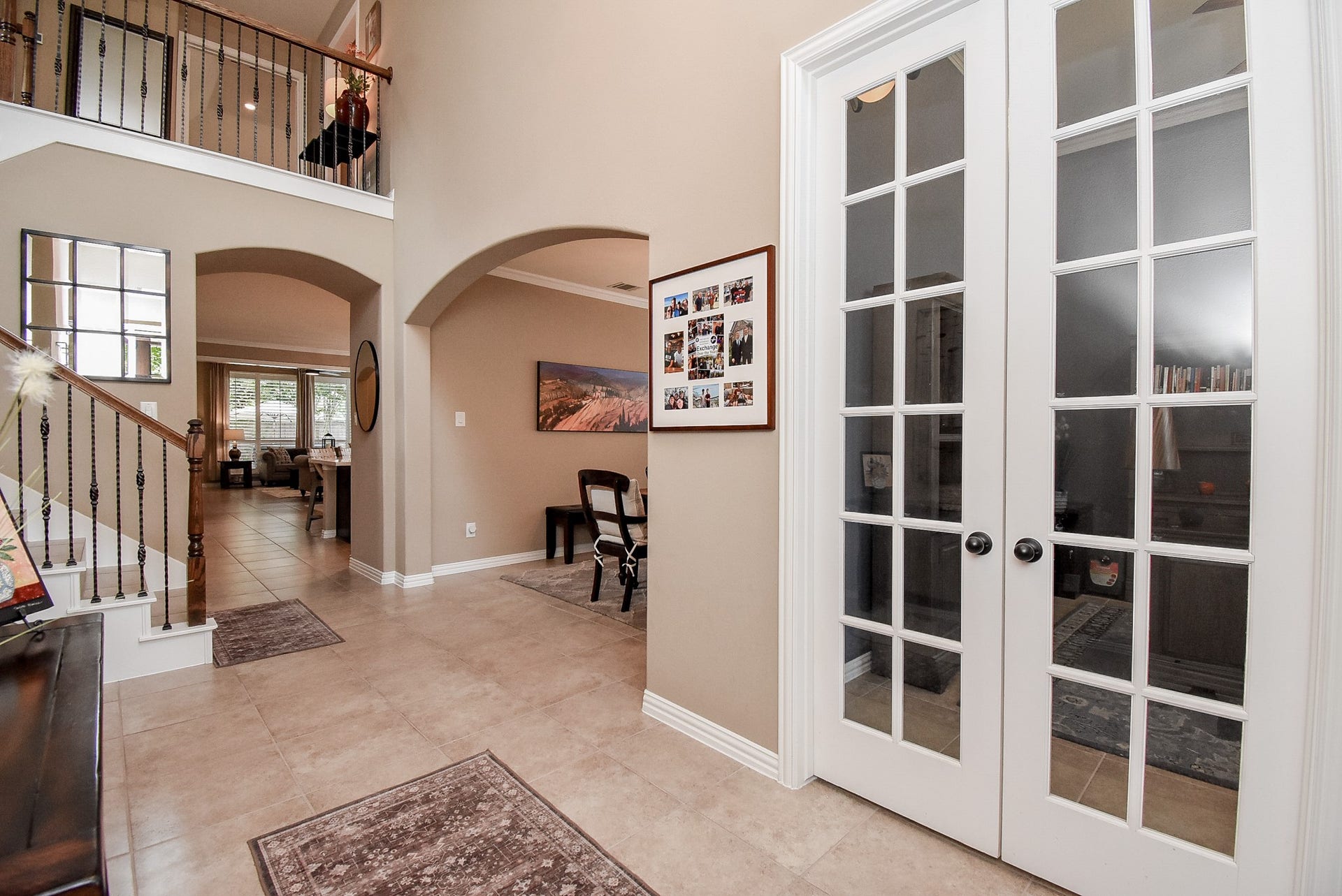 Double French glass doors lead you inside the study.