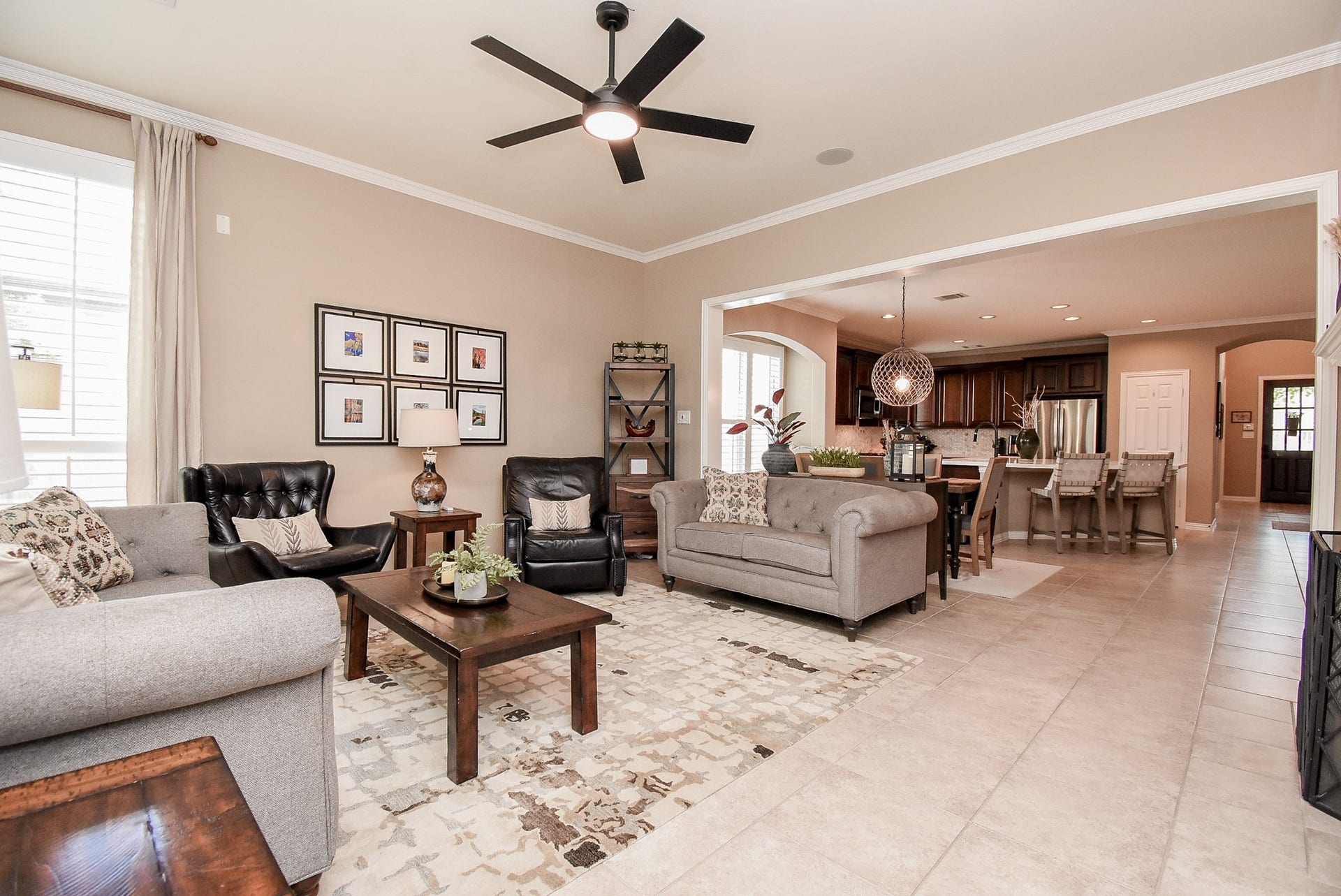 Den looking back into open space that is perfect for all of your holiday and family/friend gatherings/parties.