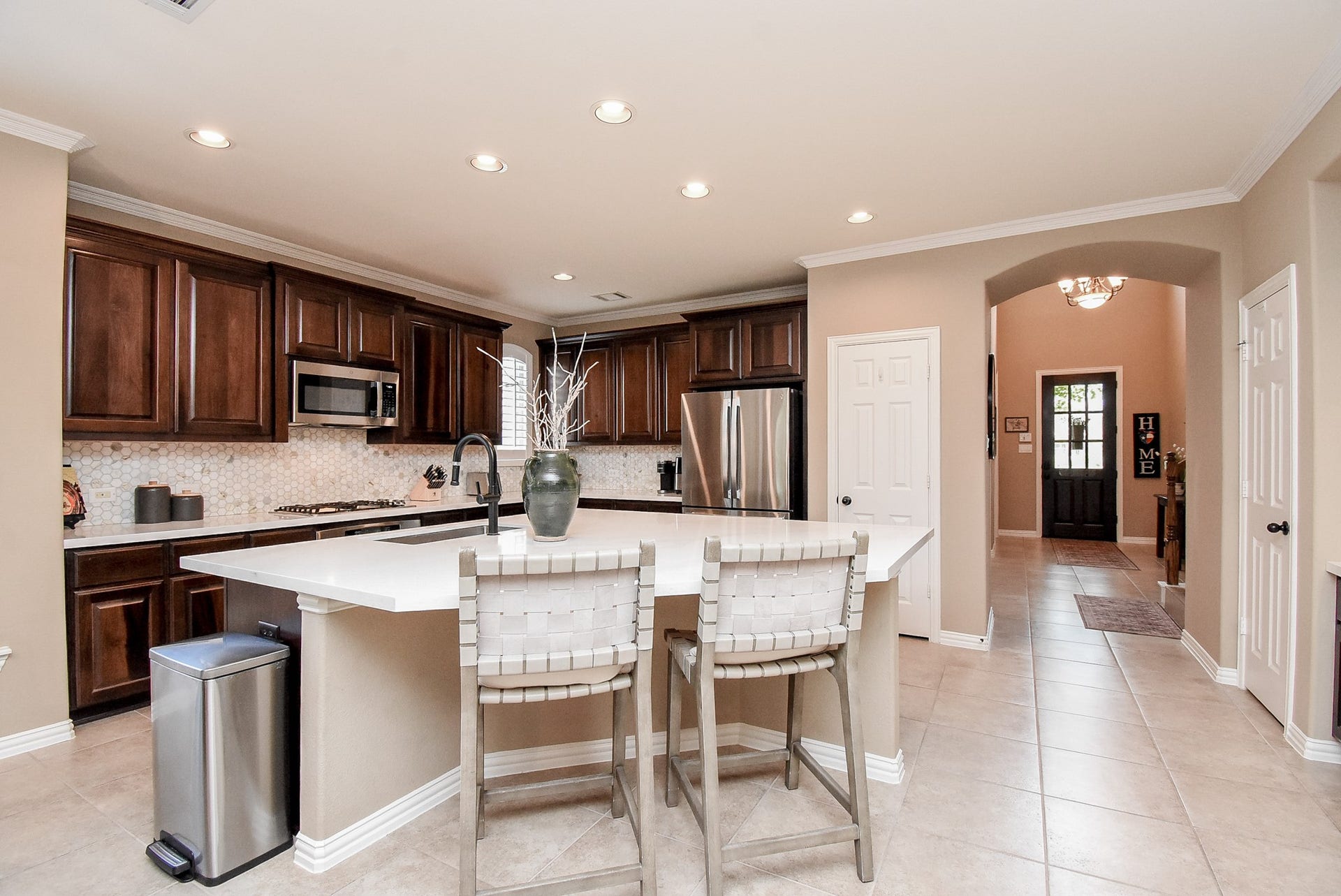 Kitchen Island also serves as a perfect breakfast bar or for just sitting and talking while preparing meals.