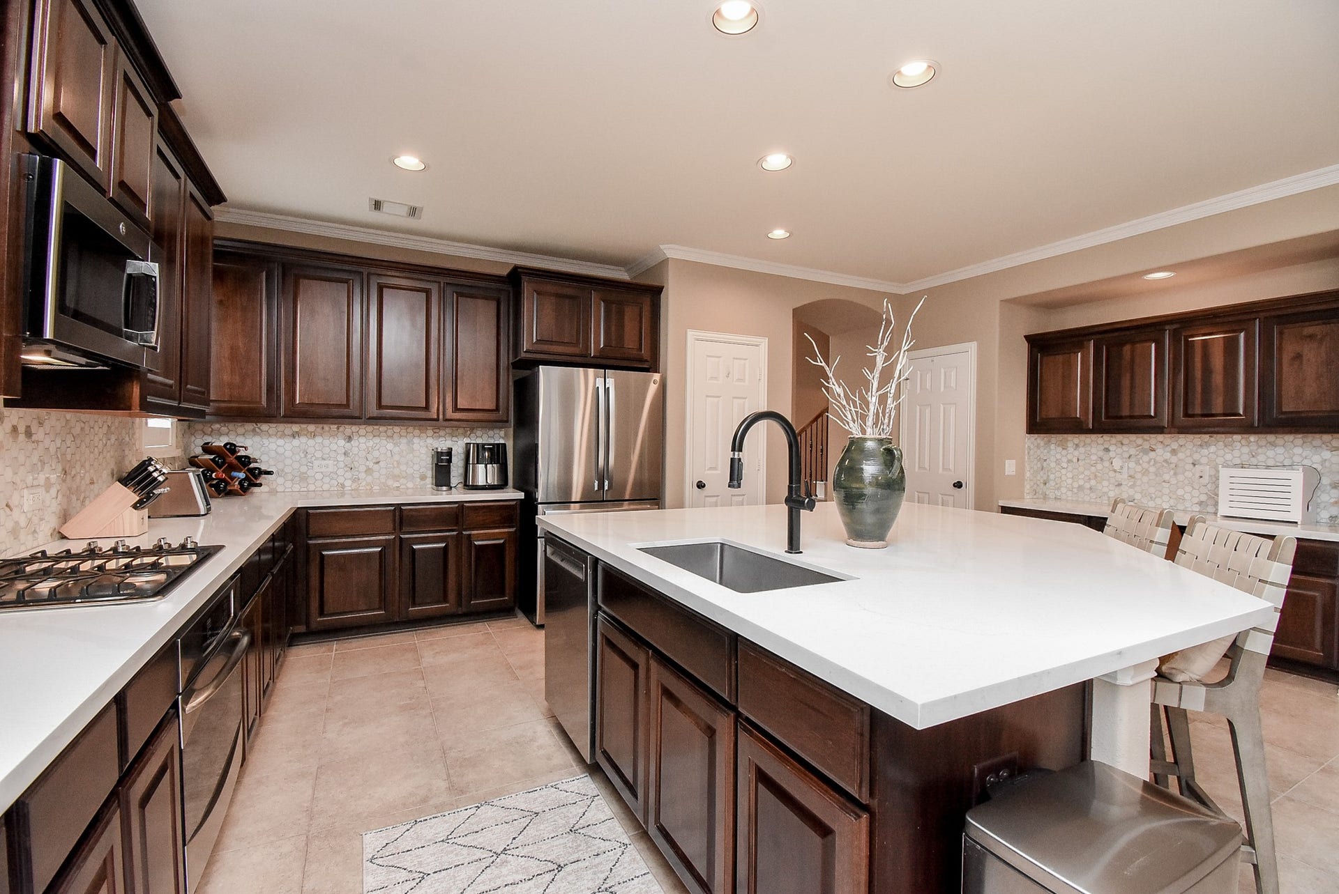 You need storage, well this kitchen has it with stainless steel appliances and new countertops.