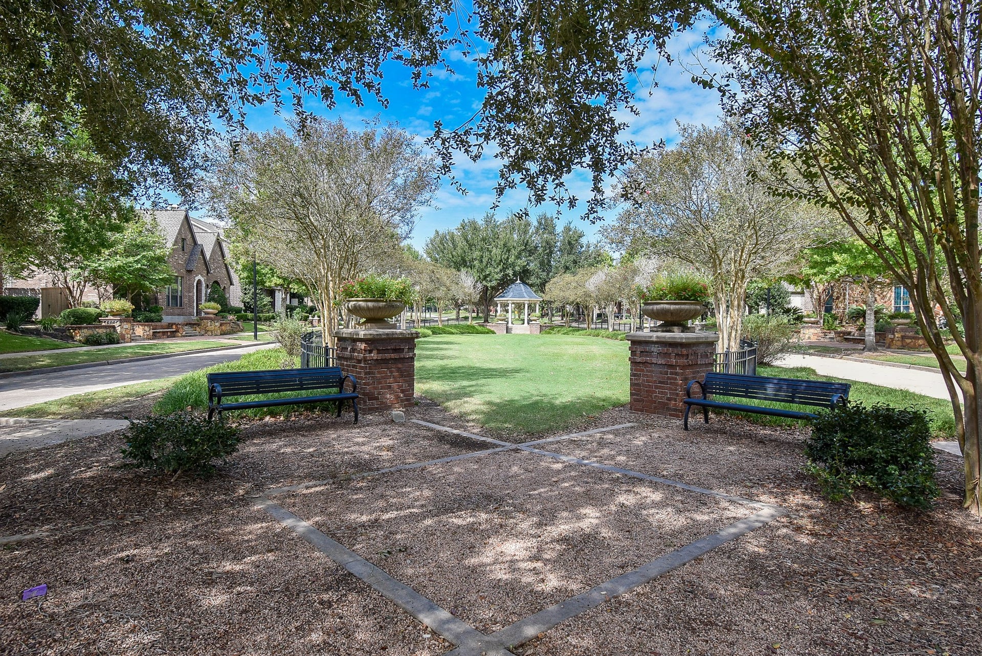 Park benches, walkways into green areas all within a few yards from your front door, how's that for extra amenities you can actually use when you want.
