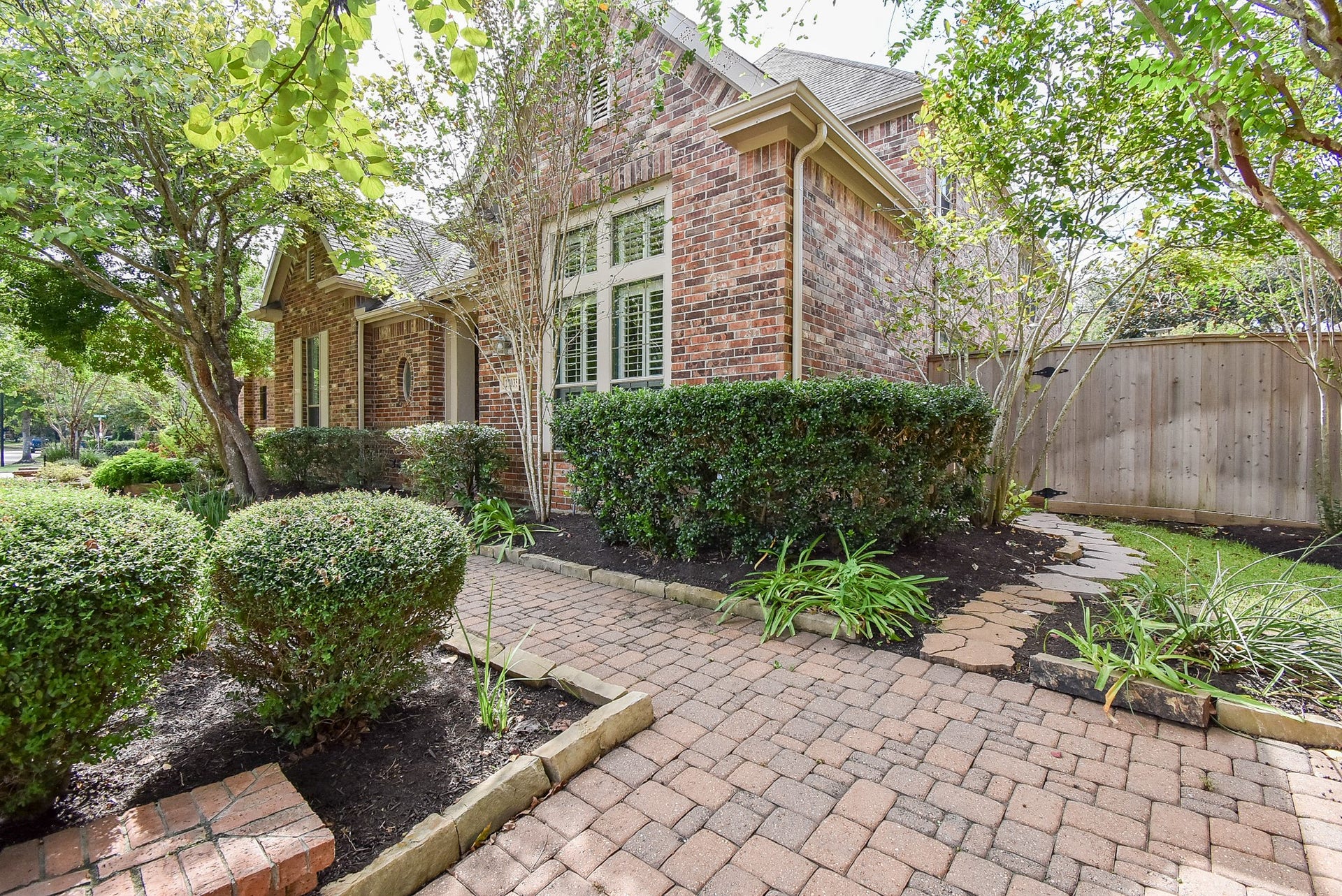 Paver walkway up to front door is just another example of all that has gone into making this home special.