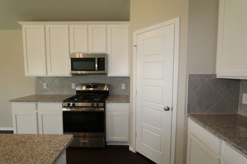 Granite countertops and island with sink