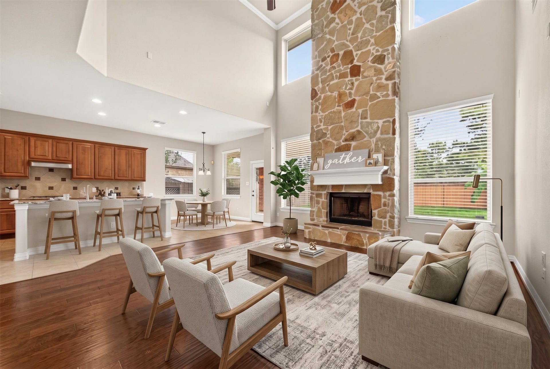 Open family room and kitchen, ideal for gathering (Virtually staged)