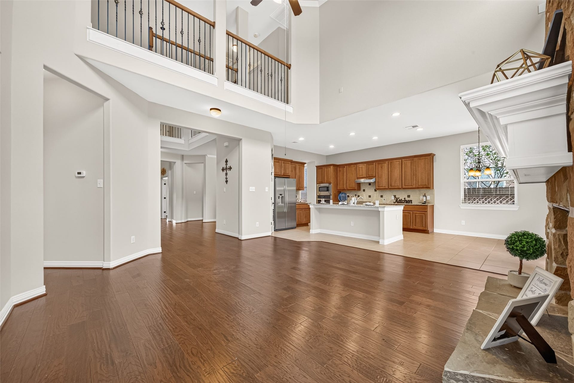 Two-story family room ceiling with upstairs balcony view