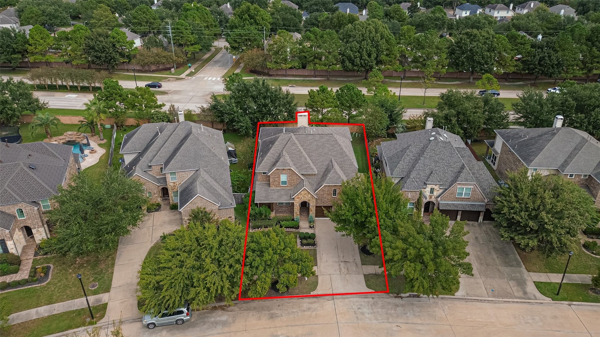 Aerial view of the home and surrounding area