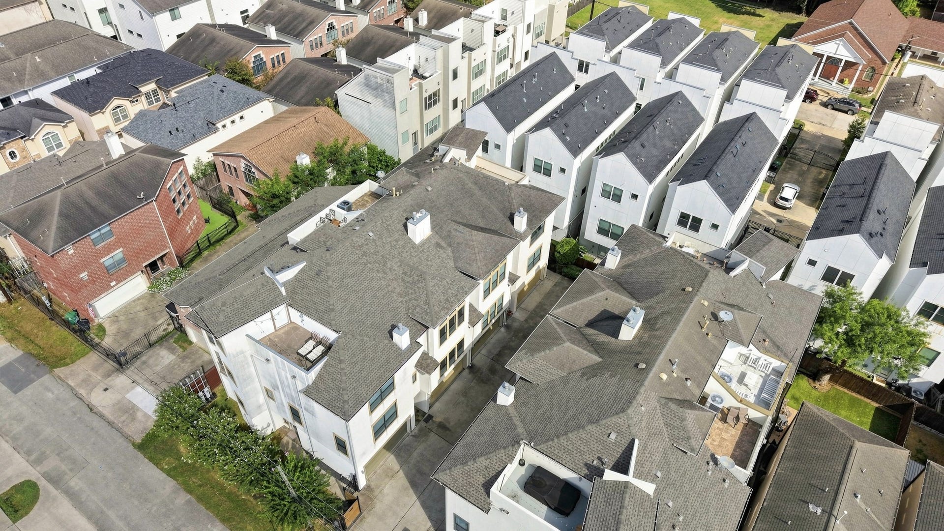 Aerial view highlighting the homes corner location within the residential community.