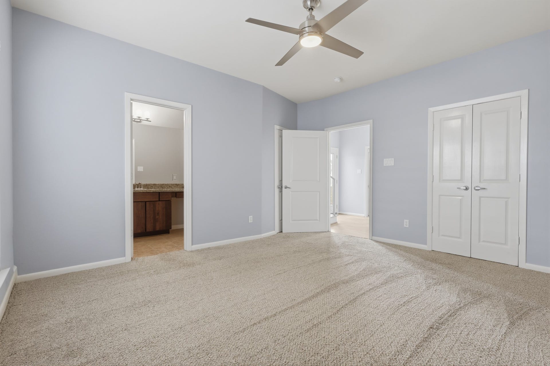 First floor secondary bedroom with direct entry into its full en suite bathroom, providing added privacy and convenience for residents or guests.