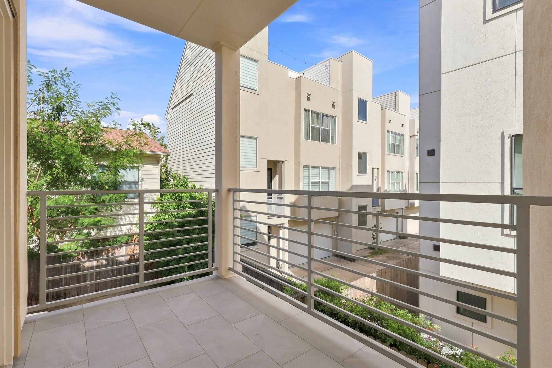 Private balcony offering an additional outdoor living space, with room for seating.