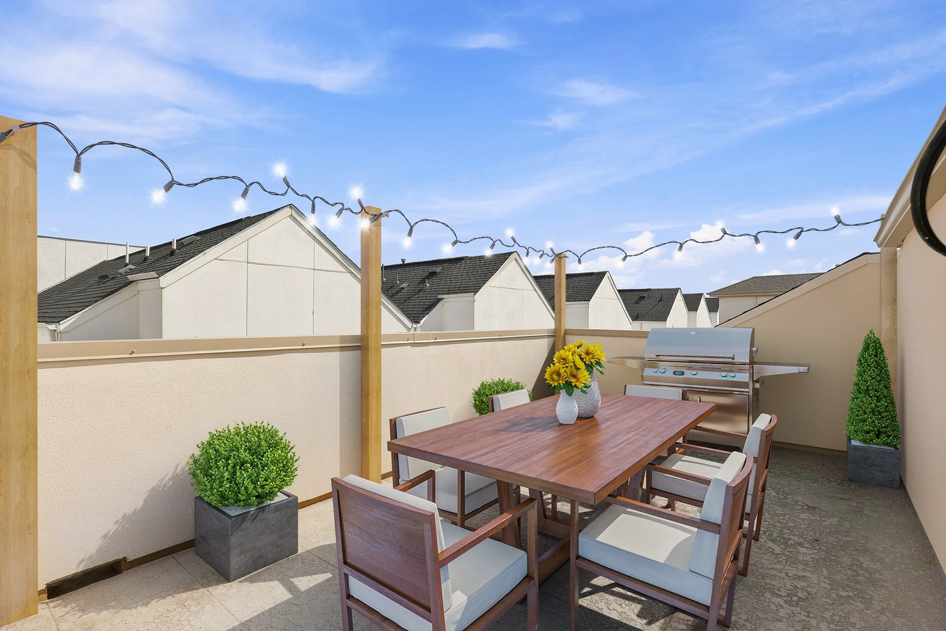 Virtually staged rooftop terrace illustrating the potential for outdoor dining, entertaining, and relaxing.
